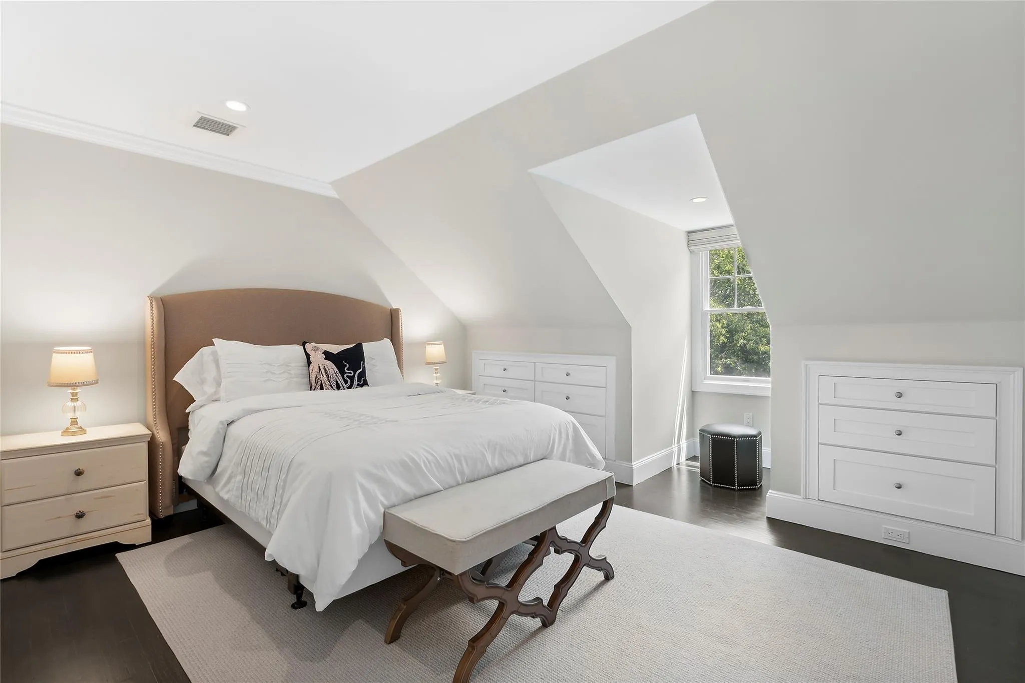 Bedroom with dark wood-style flooring, recessed lighting, baseboards, and vaulted ceiling Bedroom with dark wood-style flooring, recessed lighting, baseboards, and vaulted ceiling