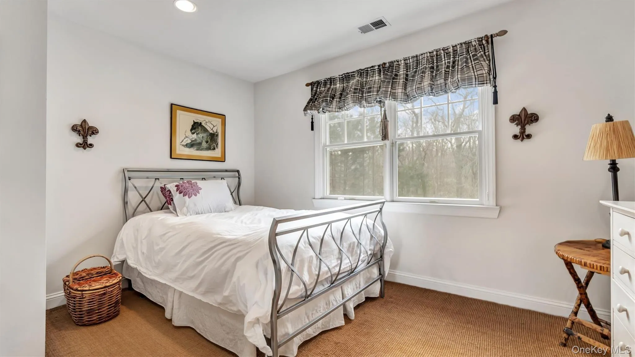 Bedroom with recessed lighting, baseboards, visible vents, and light carpet Bedroom with recessed lighting, baseboards, visible vents, and light carpet