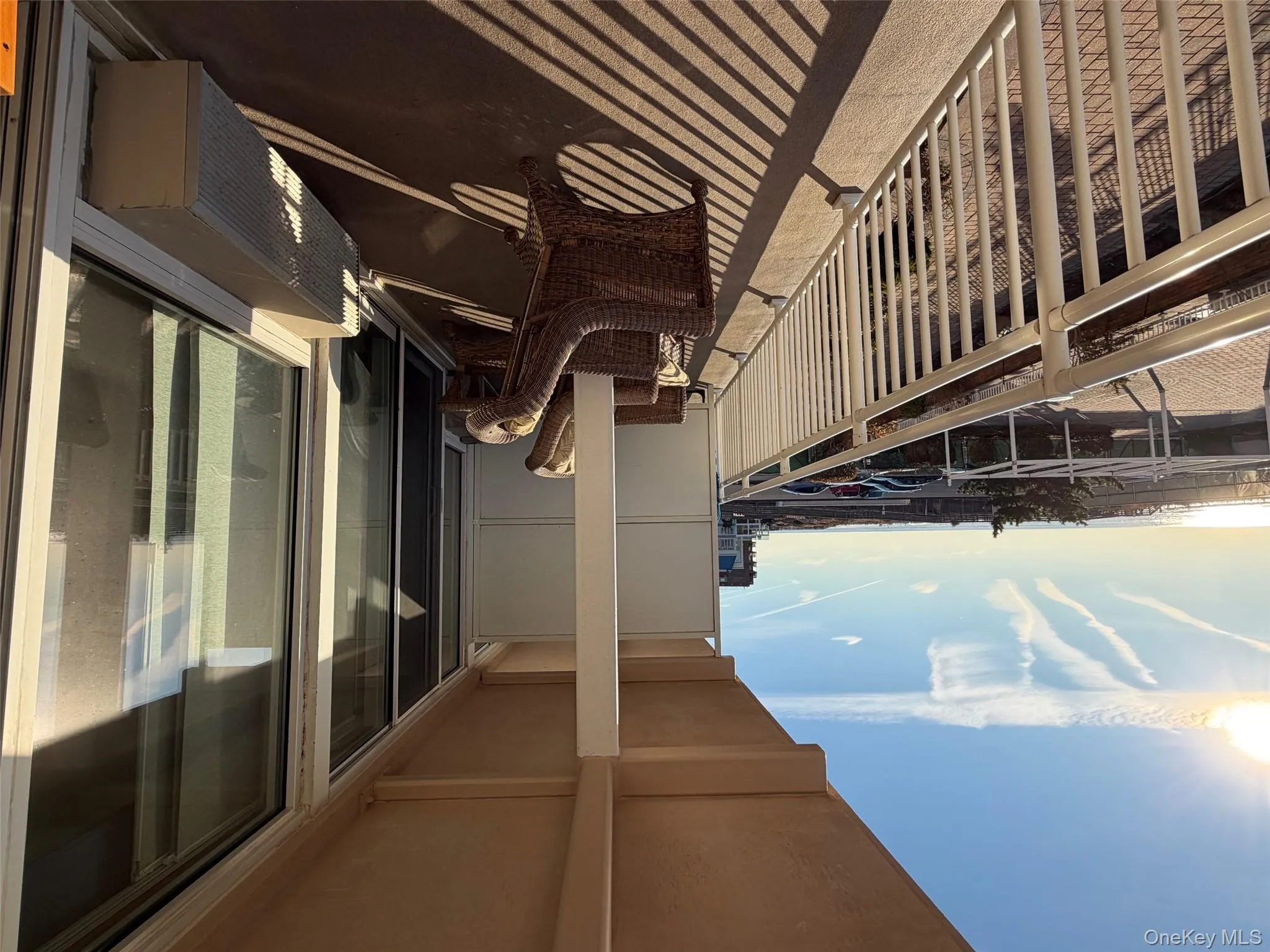 Balcony with an AC wall unit Balcony with an AC wall unit