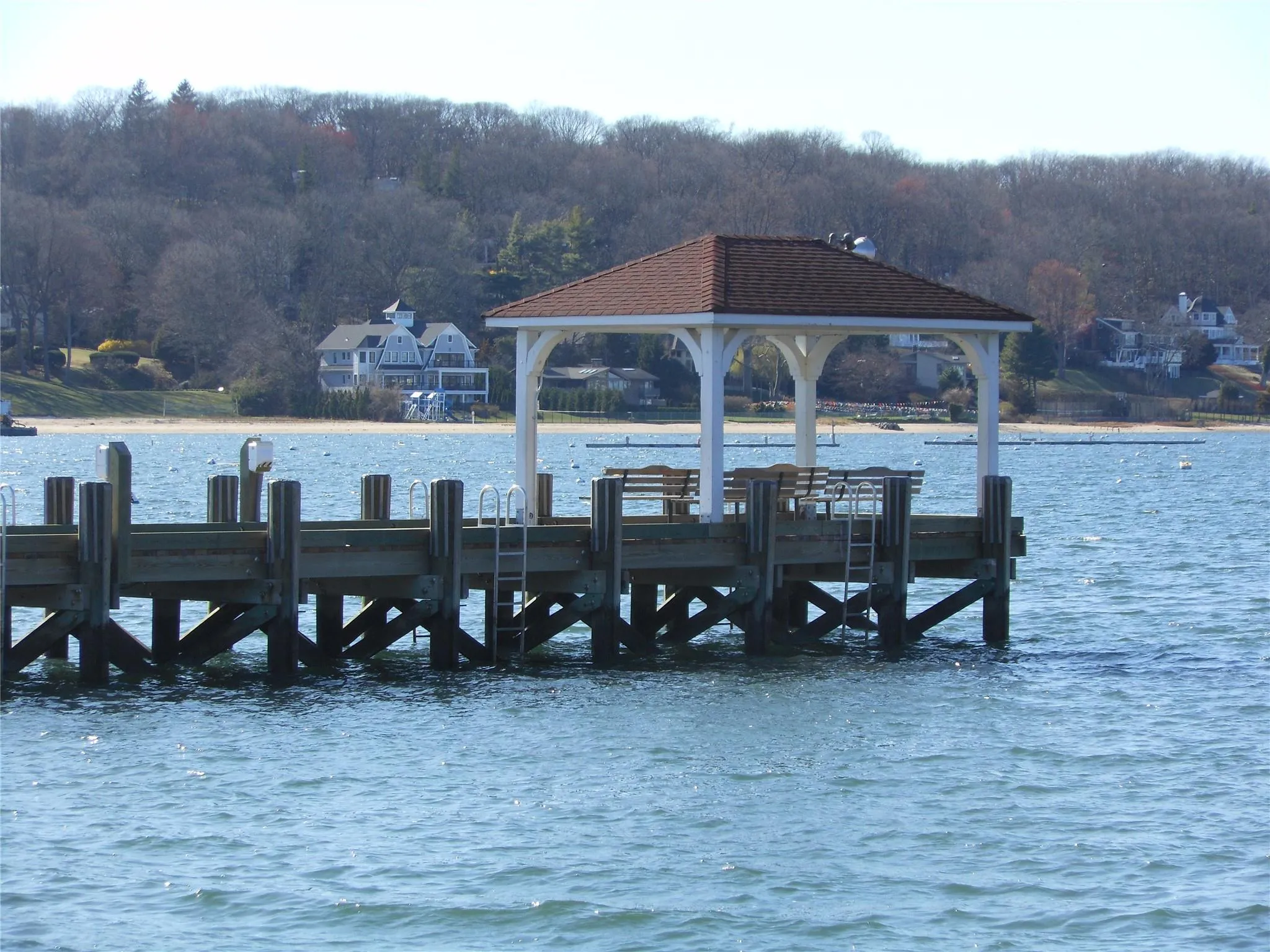 View of dock featuring a gazebo, a water view, and a forest view View of dock featuring a gazebo, a water view, and a forest view
