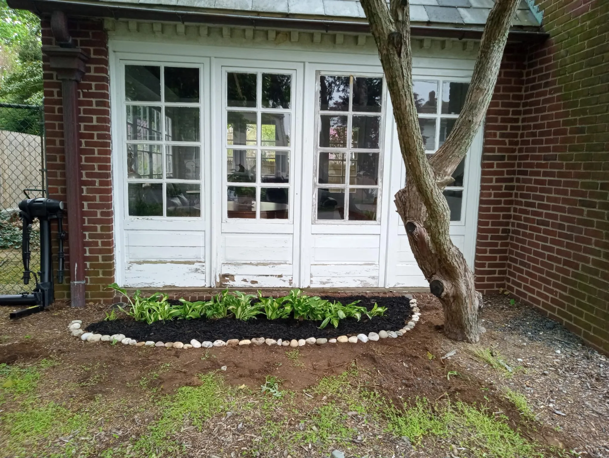 View of side of property with brick siding View of side of property with brick siding