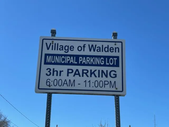 Sign for the Municipal Parking lot across the street. Sign for the Municipal Parking lot across the street.
