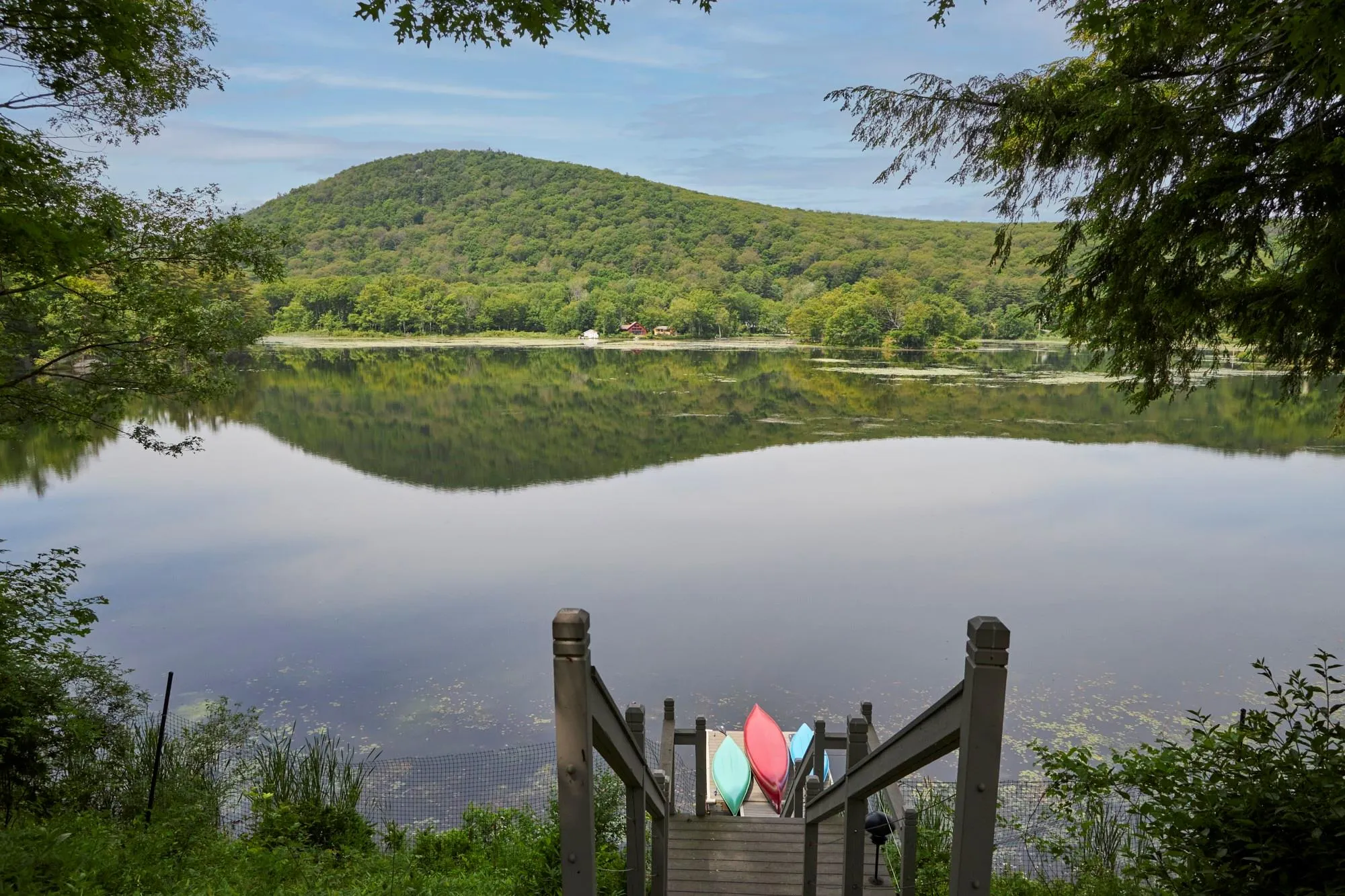 Dock area featuring a water and mountain view Dock area featuring a water and mountain view
