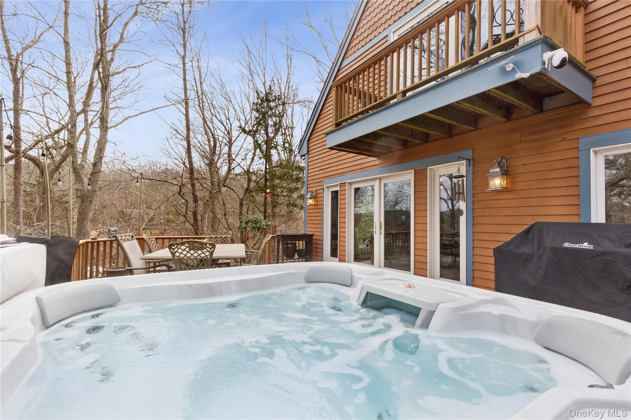 Front Deck Main Entry to Home. Hot Tub and Seating for Your Enjoyment. Propane Gas Grill for Outdoor Cooking Front Deck Main Entry to Home. Hot Tub and Seating for Your Enjoyment. Propane Gas Grill for Outdoor Cooking