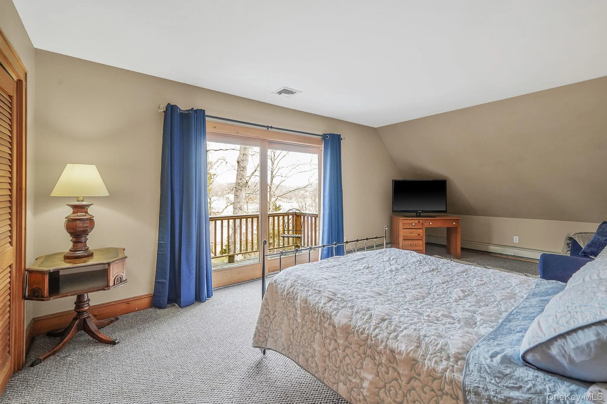 Large Second Floor Bedroom with Private Juliet Balcony Overlooking Outdoor Decking Area. Great Inlet Views from Here Off Season. Queen Sized Bed. Large Second Floor Bedroom with Private Juliet Balcony Overlooking Outdoor Decking Area. Great Inlet Views from Here Off Season. Queen Sized Bed.