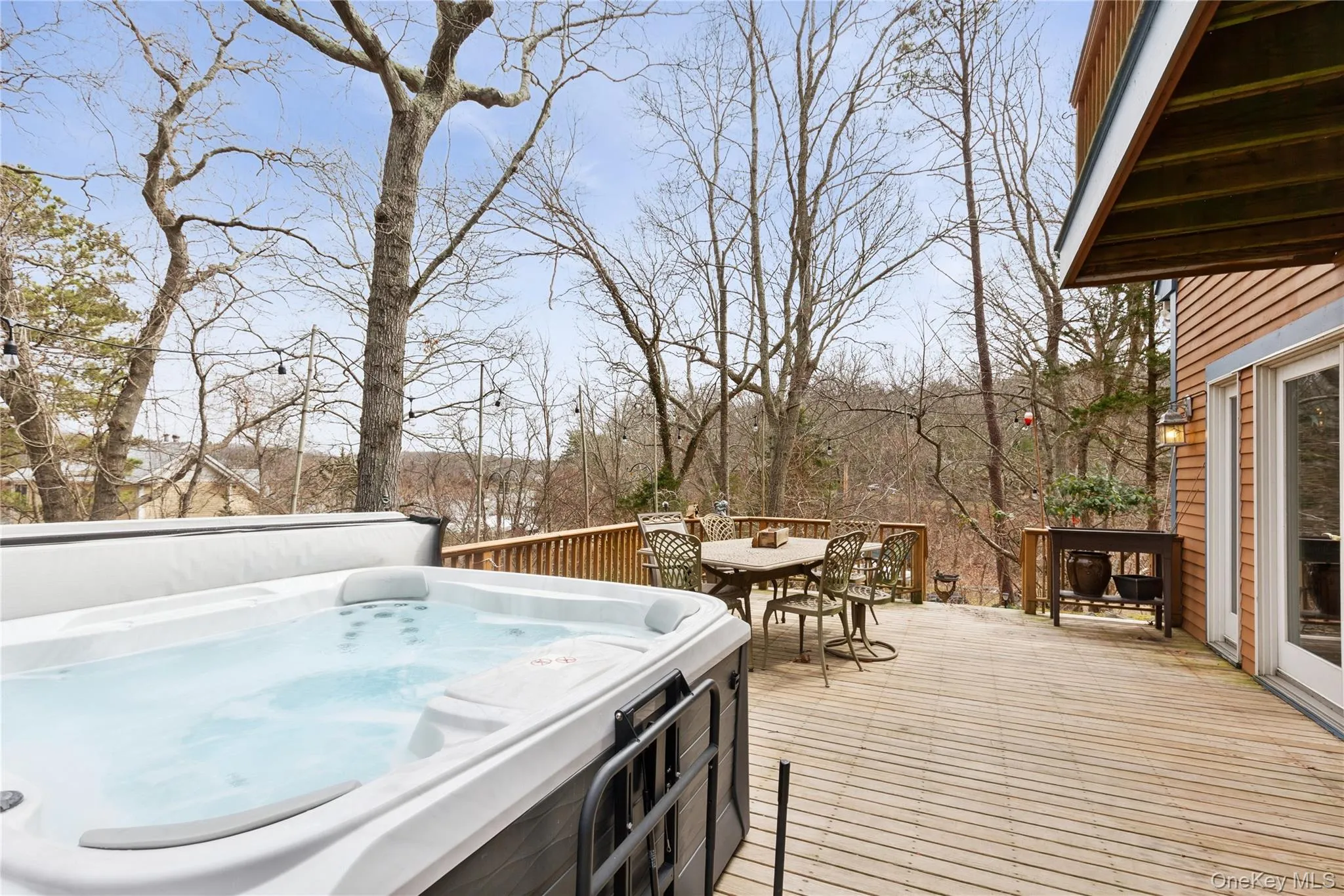 Front Deck Main Entry to Home. Hot Tub and Seating for Your Enjoyment. Propane Gas Grill for Outdoor Cooking. Inlet Views Here Front Deck Main Entry to Home. Hot Tub and Seating for Your Enjoyment. Propane Gas Grill for Outdoor Cooking. Inlet Views Here