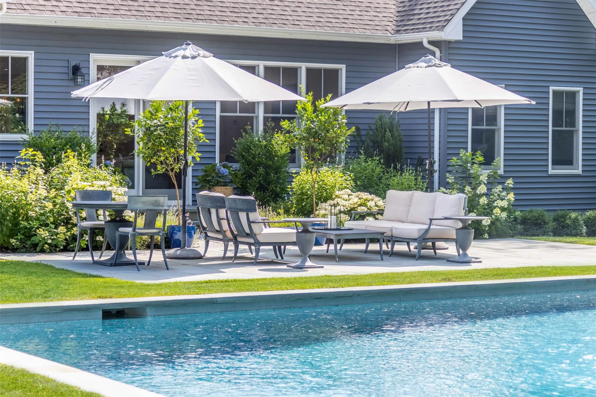 Outdoor pool featuring a patio Outdoor pool featuring a patio