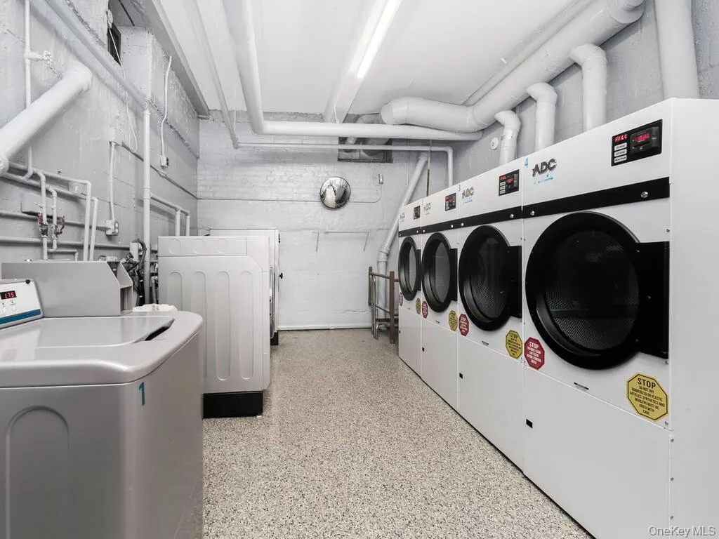 Shared laundry area featuring washer and dryer Shared laundry area featuring washer and dryer