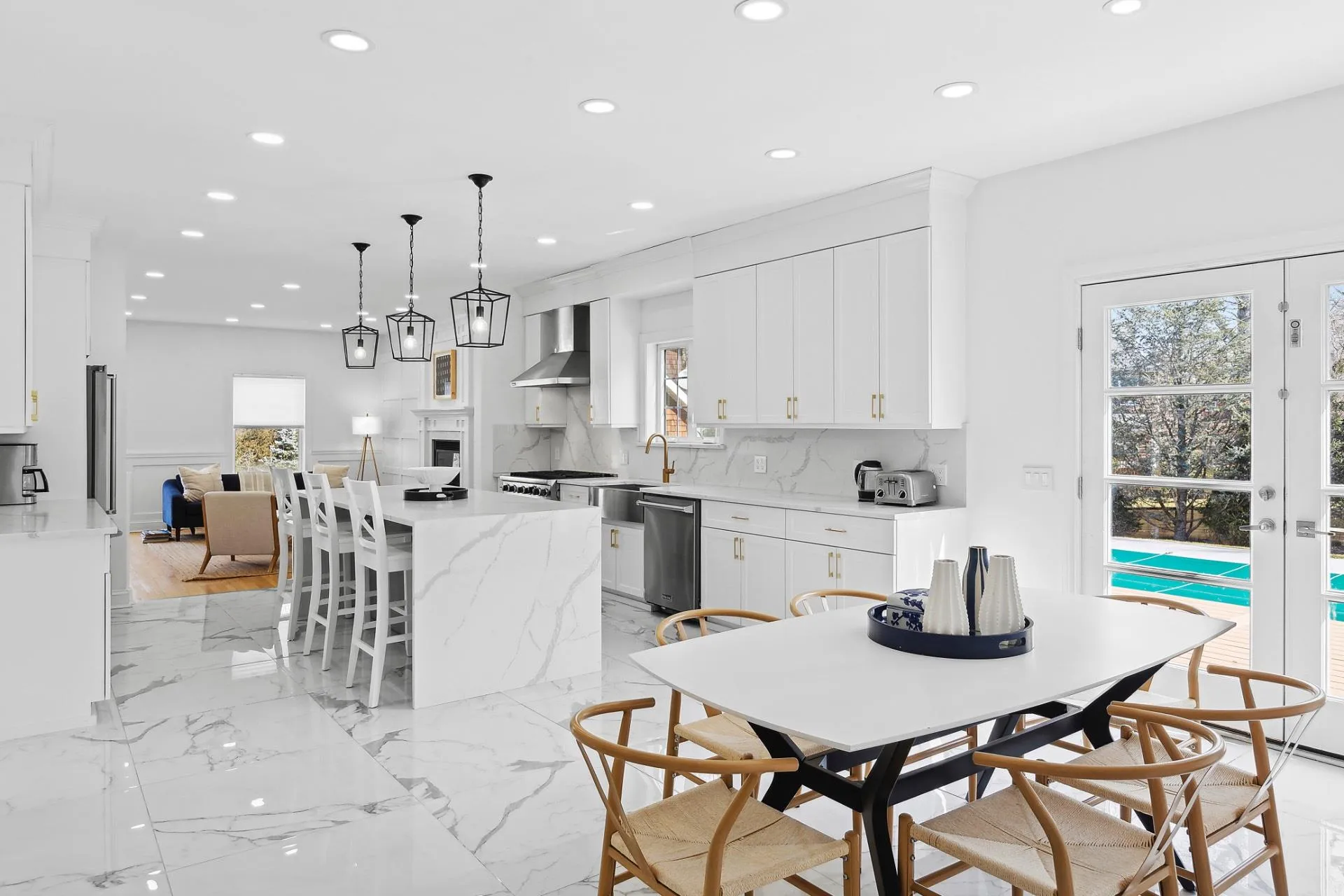 Dining room featuring marble finish floor, a toaster, and recessed lighting Dining room featuring marble finish floor, a toaster, and recessed lighting