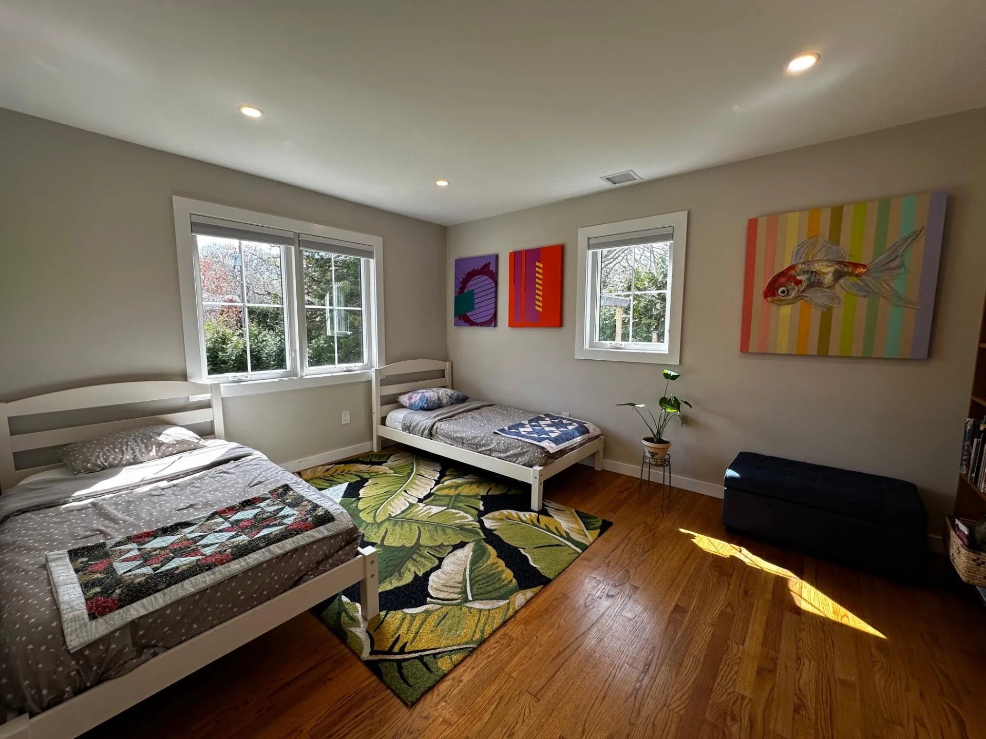 Bedroom featuring baseboards, visible vents, wood finished floors, and recessed lighting Bedroom featuring baseboards, visible vents, wood finished floors, and recessed lighting