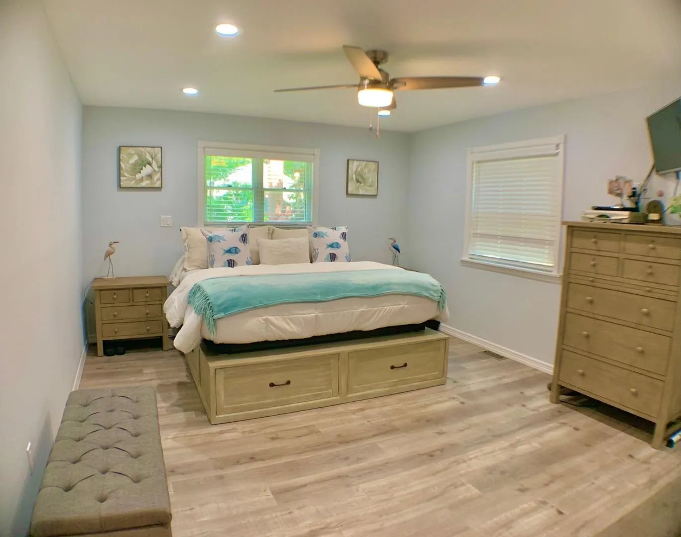 Bedroom with baseboards, light wood-style floors, recessed lighting, and a ceiling fan Bedroom with baseboards, light wood-style floors, recessed lighting, and a ceiling fan