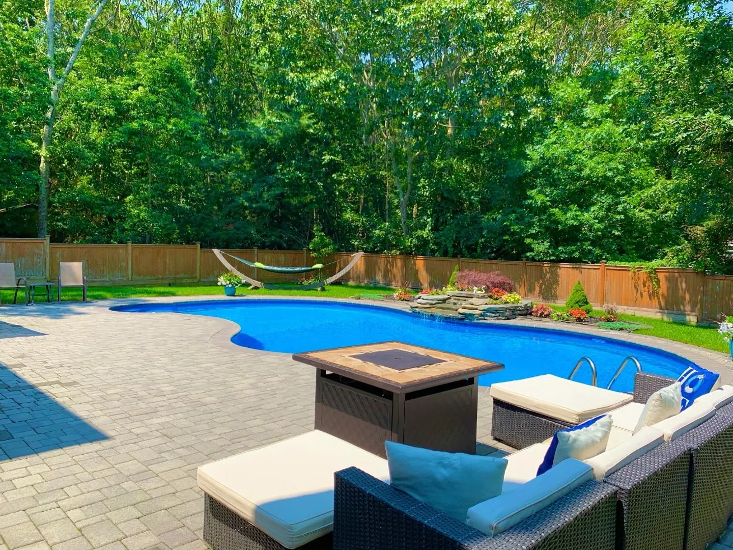 View of swimming pool featuring a fenced backyard, a patio area, and a fenced in pool View of swimming pool featuring a fenced backyard, a patio area, and a fenced in pool