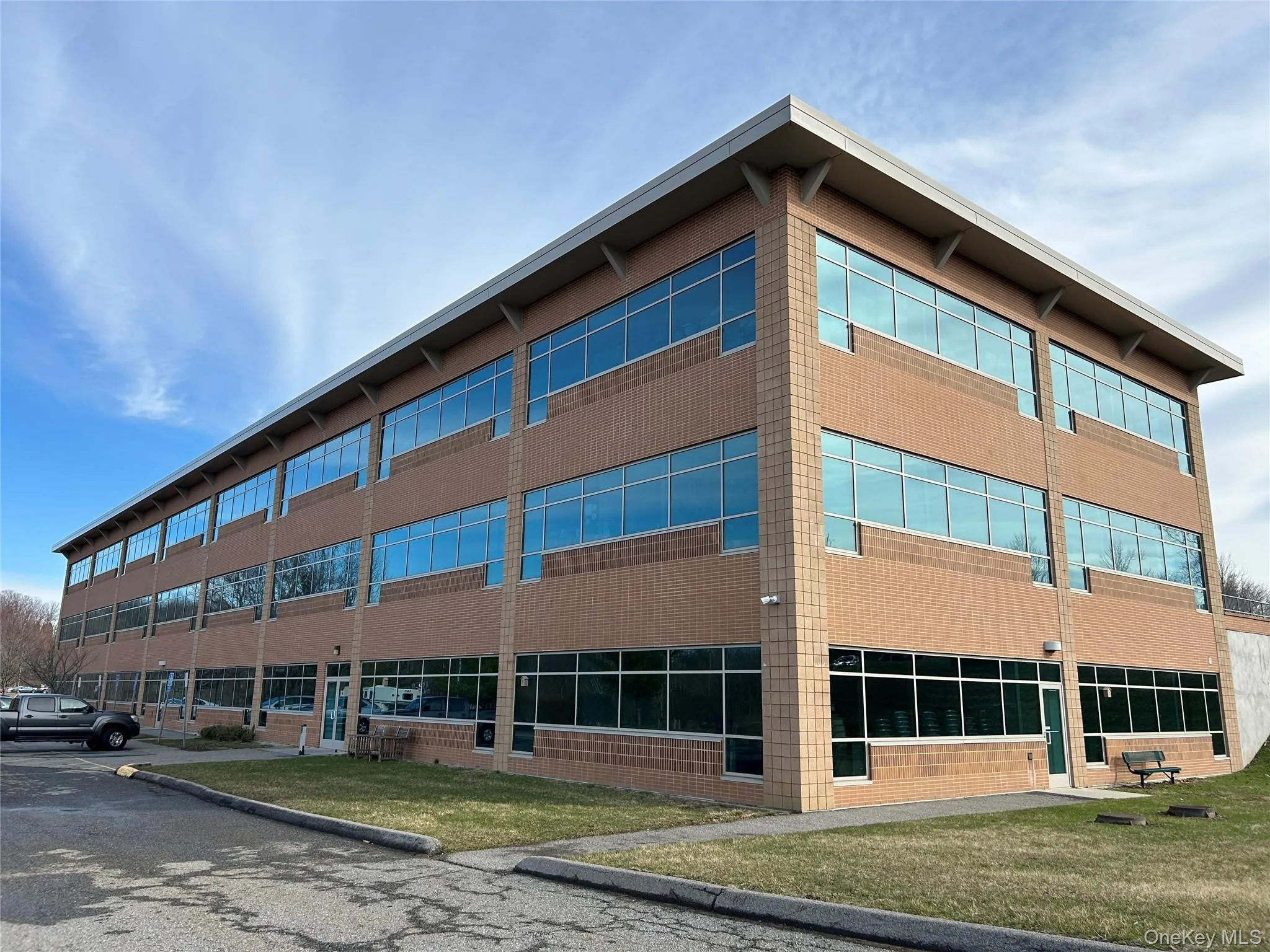 Additional Entrance to Leased Space at the back of the building with additional parking Additional Entrance to Leased Space at the back of the building with additional parking