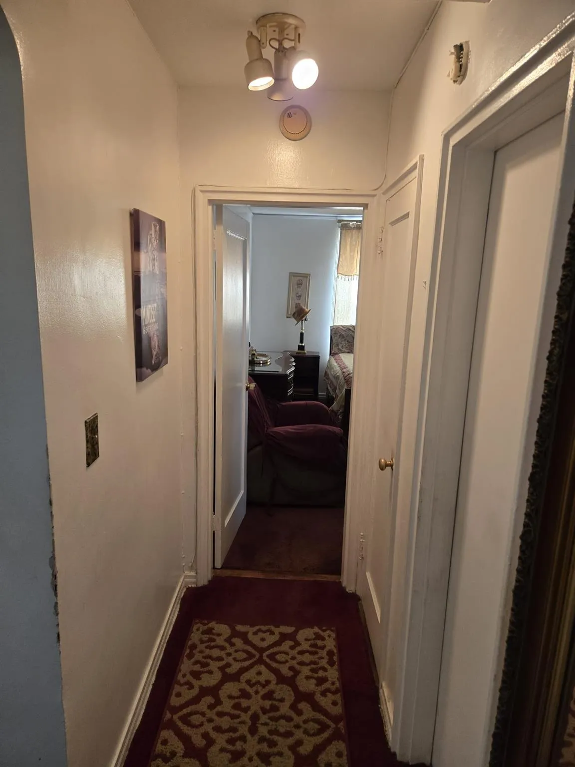 Hall featuring baseboards Hall featuring baseboards