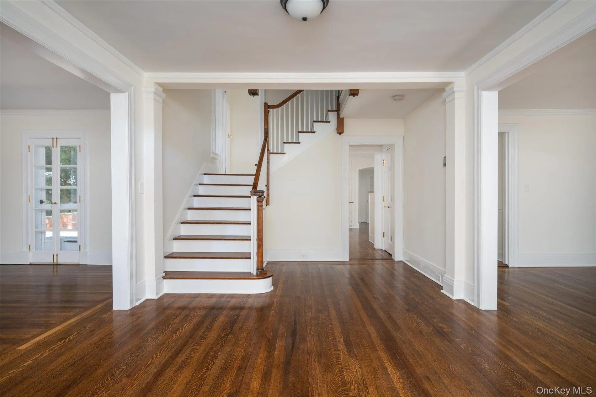 Large entry foyer with a winding 3 story staircase Large entry foyer with a winding 3 story staircase