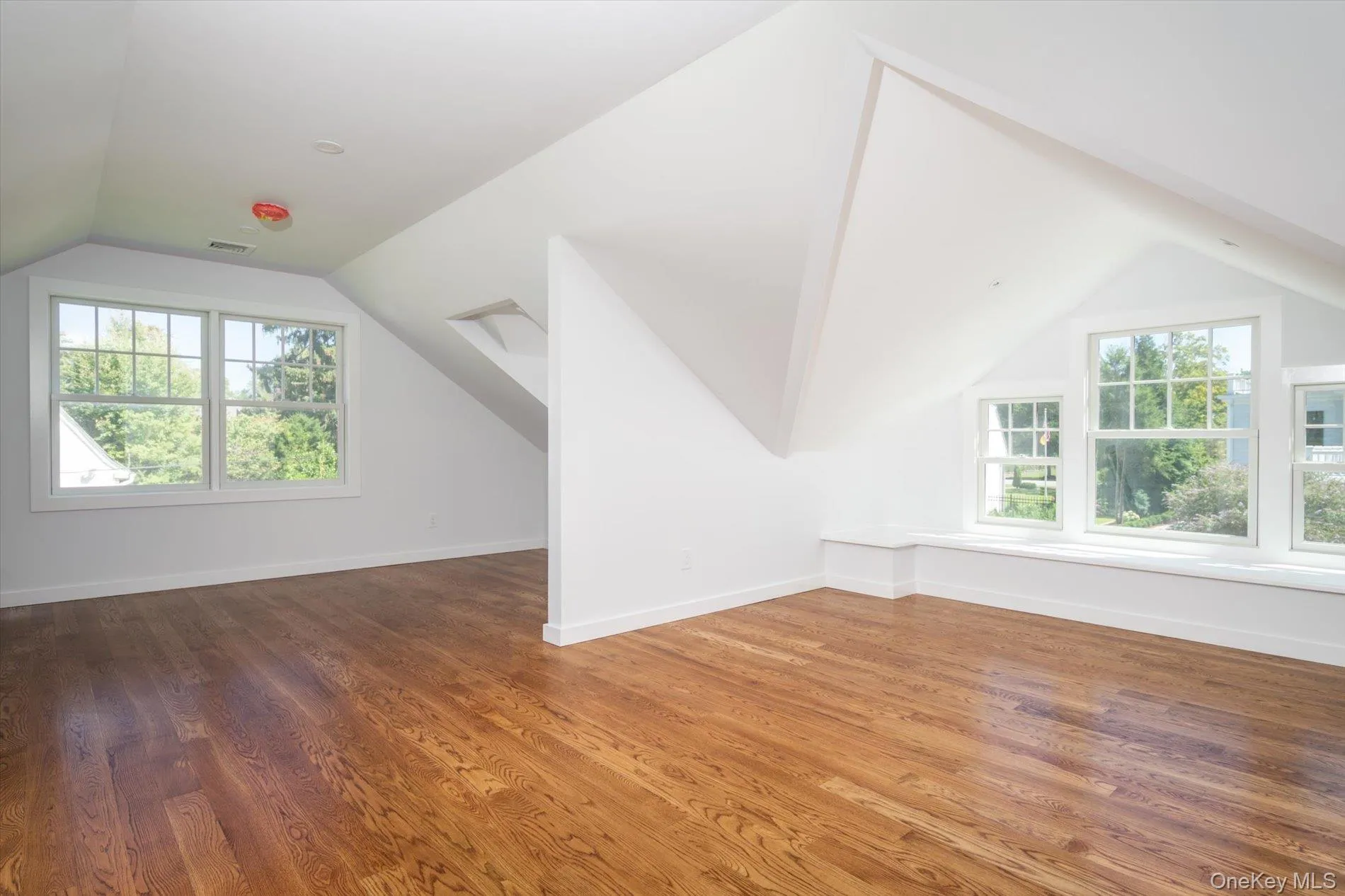 Upper level recreation room with gas fireplace and half bath Upper level recreation room with gas fireplace and half bath