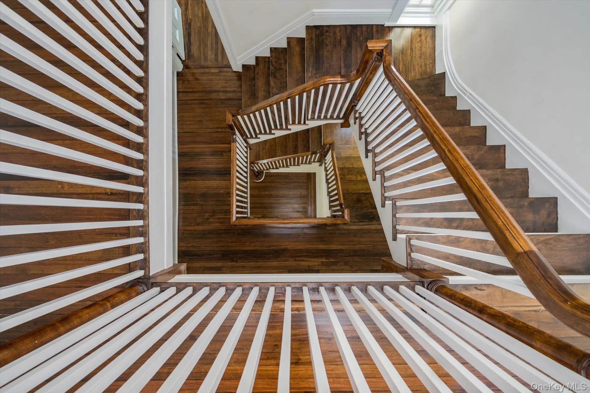 Stairs with view from top floor down Stairs with view from top floor down