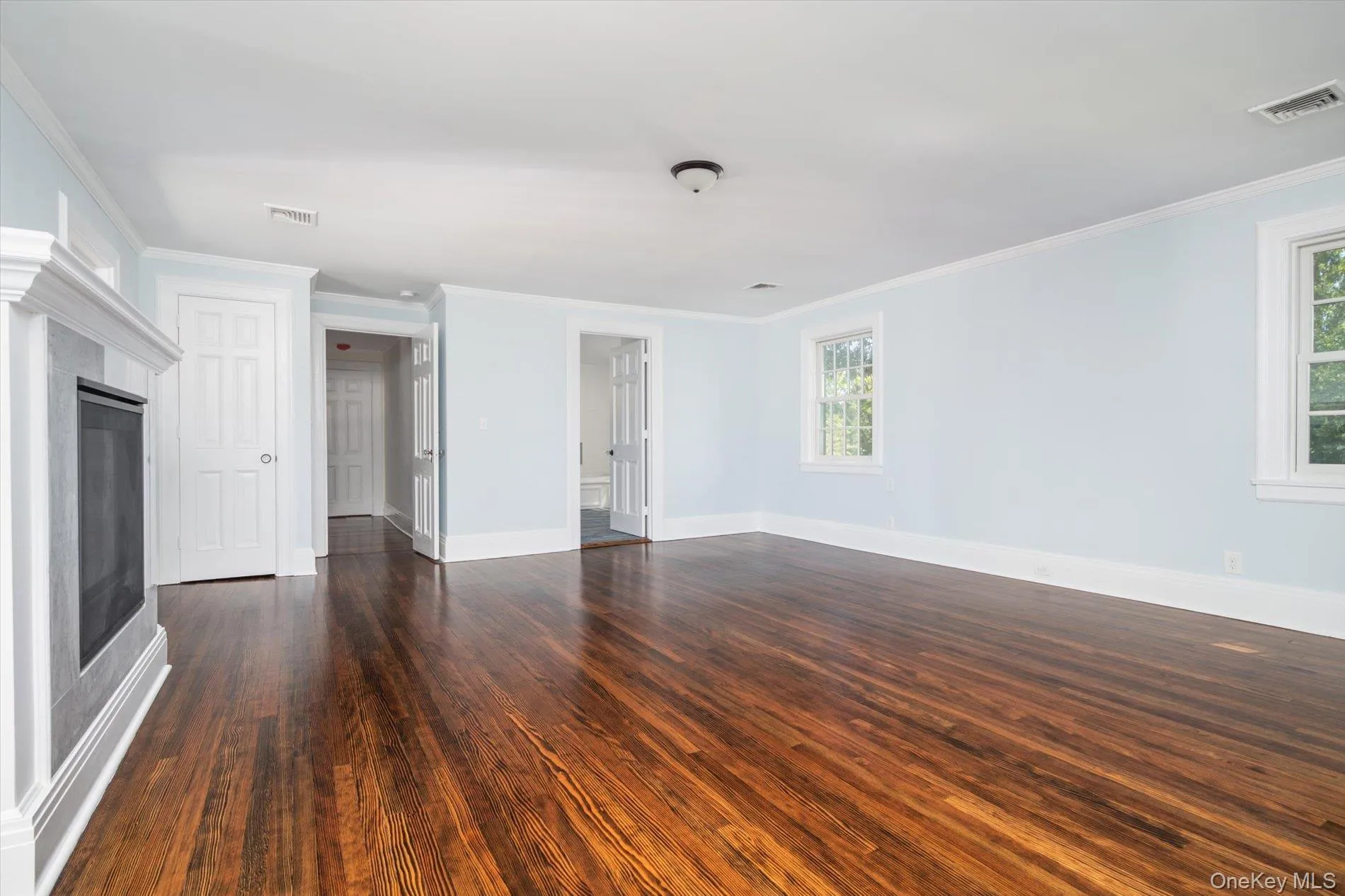 Primary bedroom with gas fireplace, expansive closet and new bathroom Primary bedroom with gas fireplace, expansive closet and new bathroom