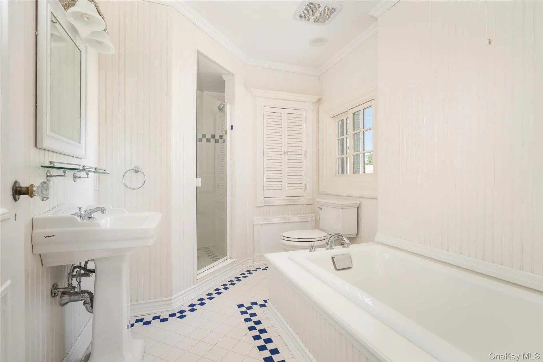 Full bathroom with soaking tub Full bathroom with soaking tub