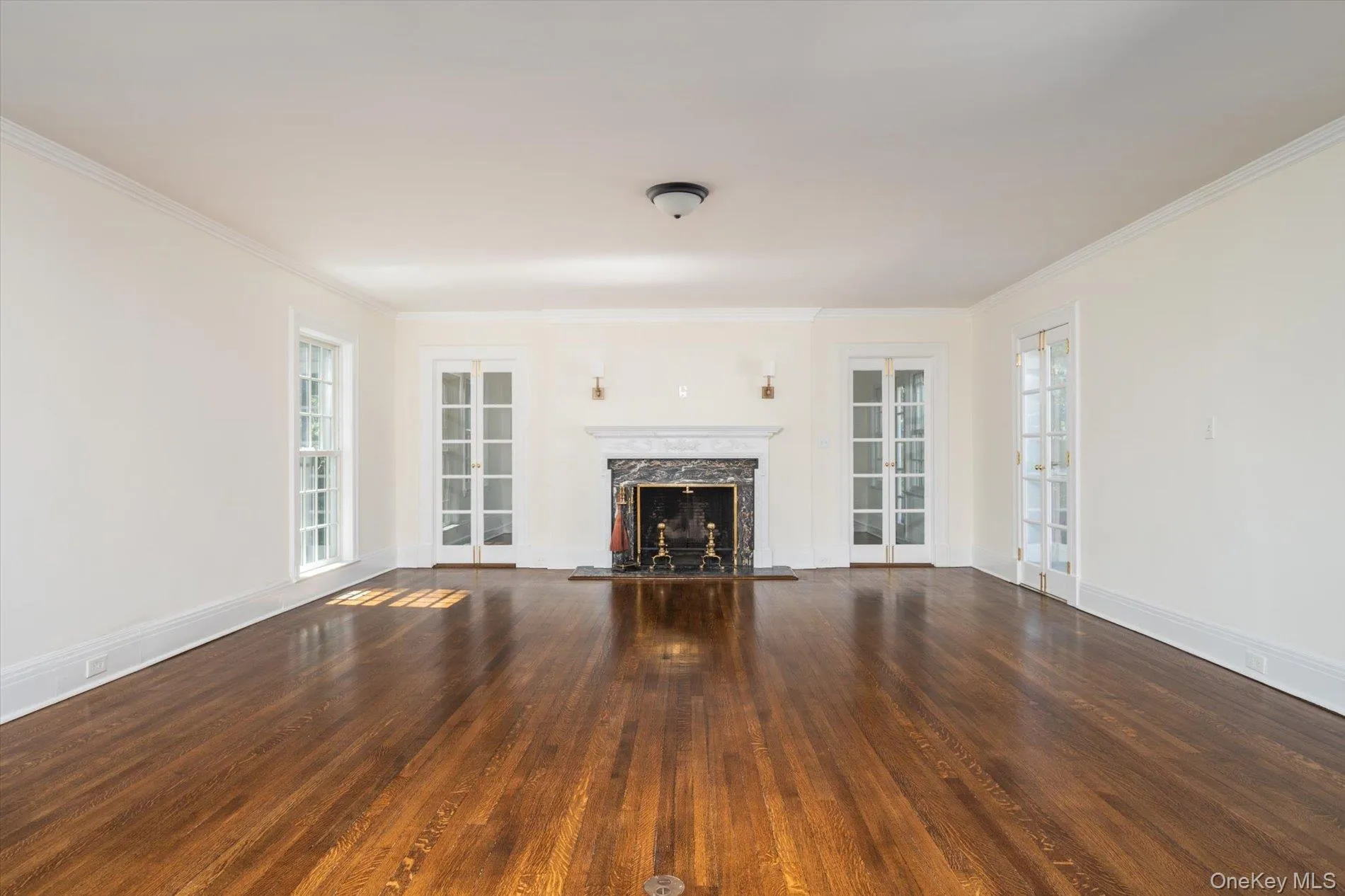 Formal living room with hardwood floors and wood burning fireplace Formal living room with hardwood floors and wood burning fireplace