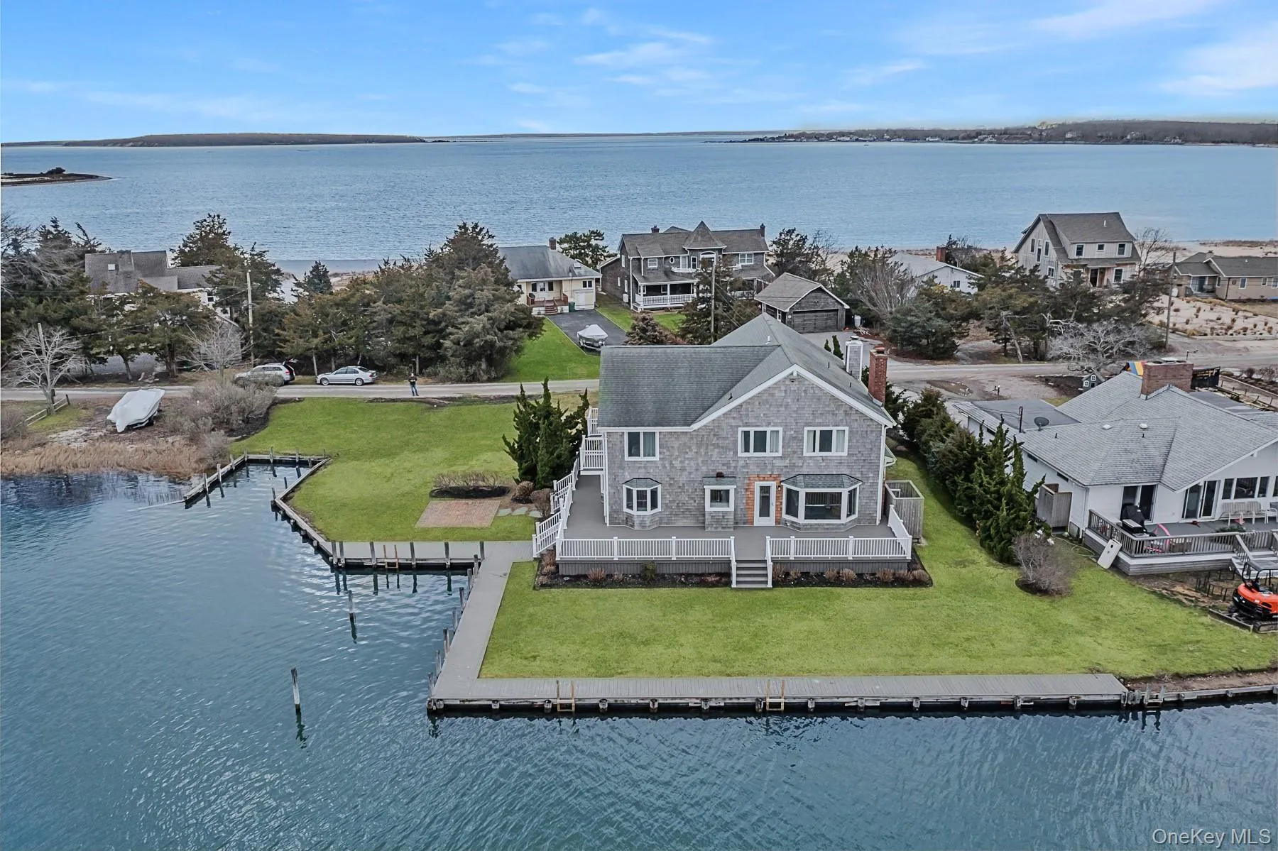 Drone / aerial view with a residential view and a water view Drone / aerial view with a residential view and a water view