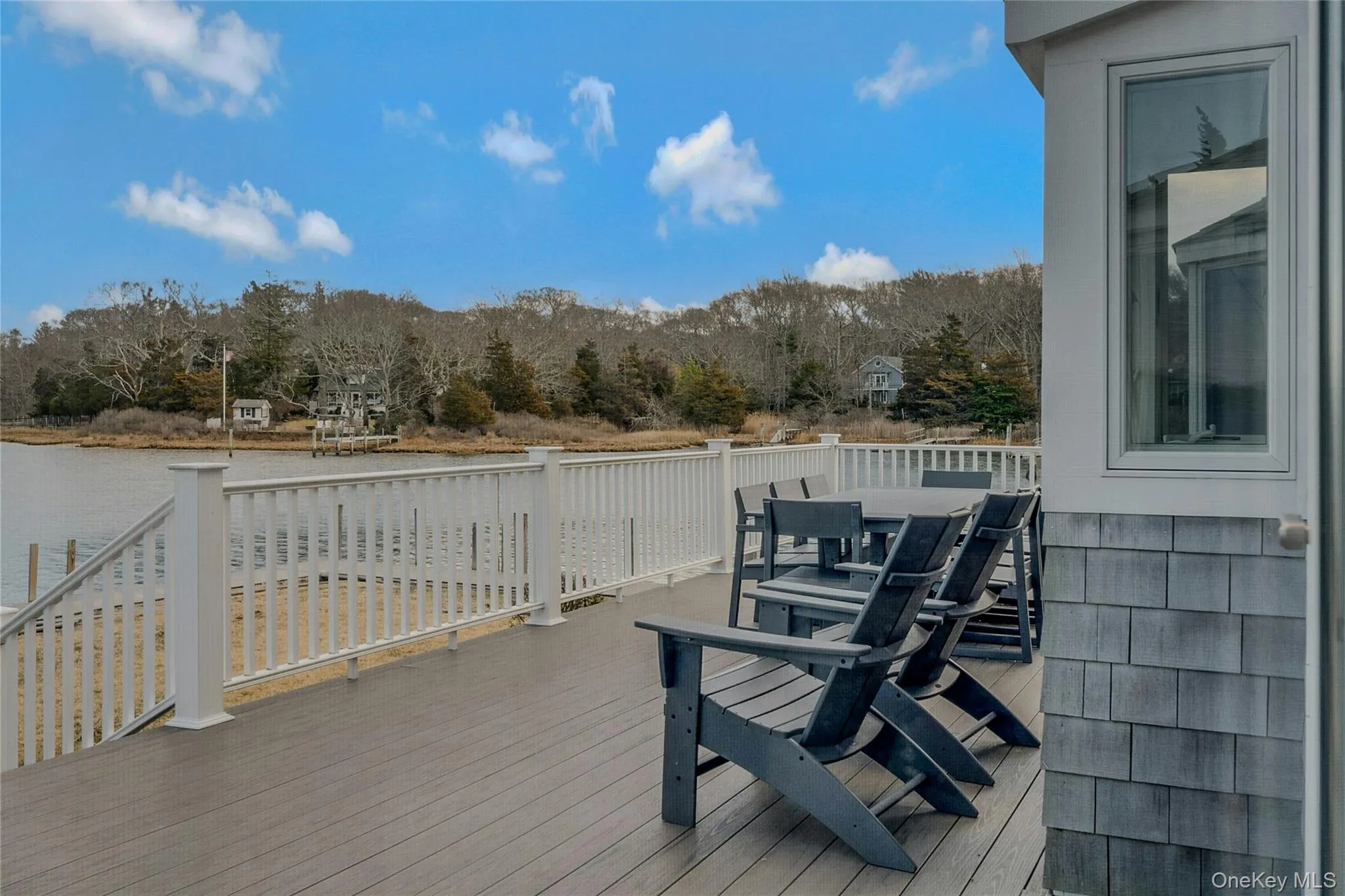 Wooden terrace featuring outdoor dining space Wooden terrace featuring outdoor dining space