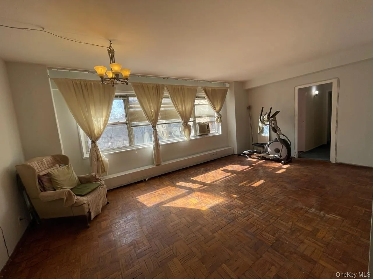 Unfurnished room with an inviting chandelier Unfurnished room with an inviting chandelier