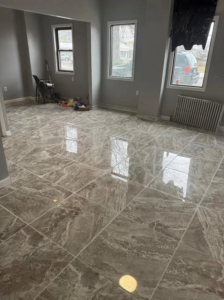 Spare room with baseboards and marble finish floor Spare room with baseboards and marble finish floor