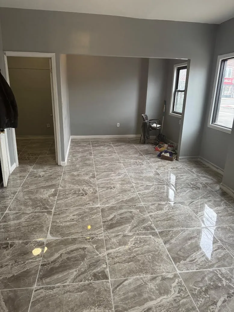 Spare room with baseboards and marble finish floor Spare room with baseboards and marble finish floor