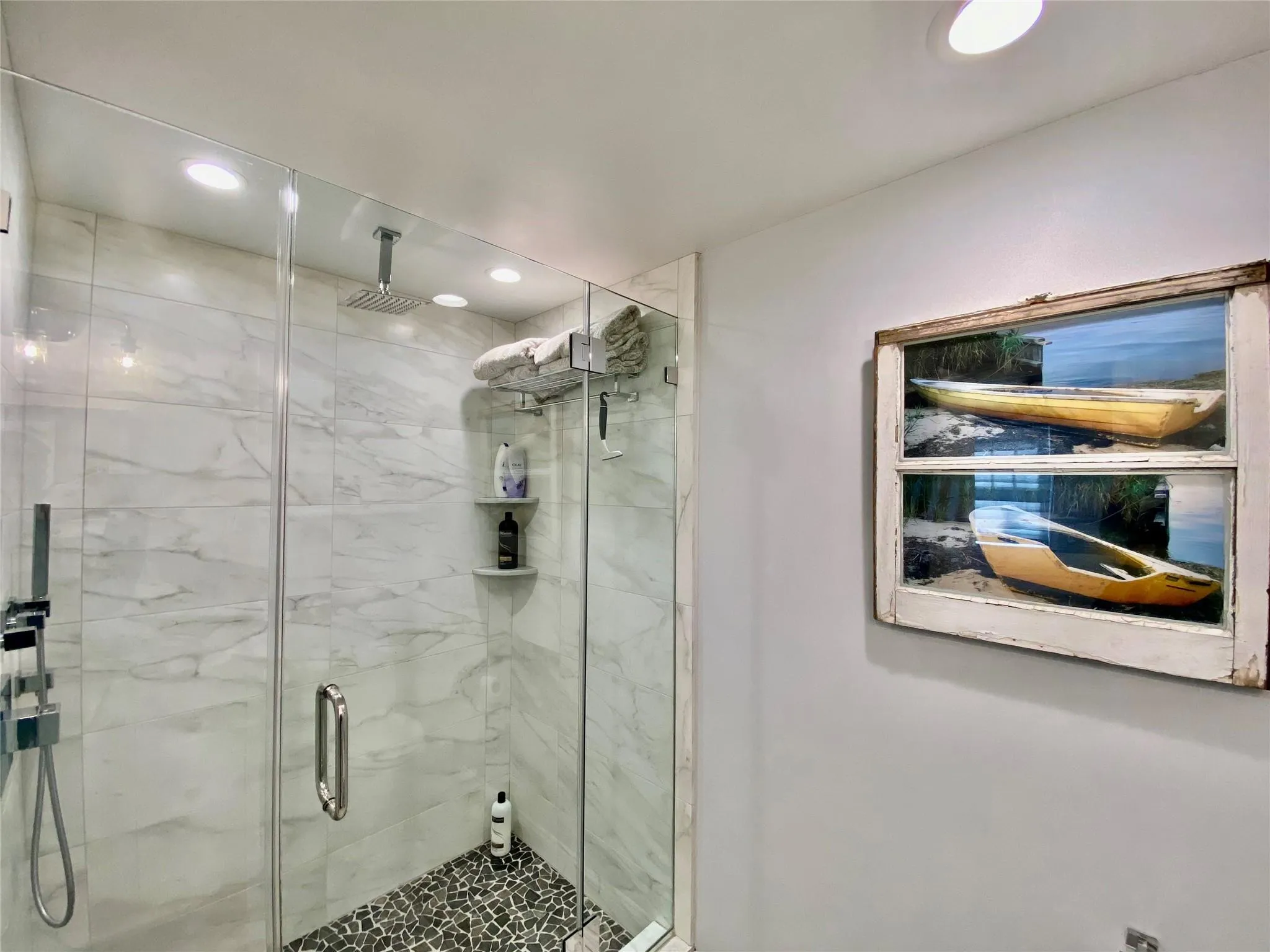 Bathroom featuring a stall shower and recessed lighting Bathroom featuring a stall shower and recessed lighting