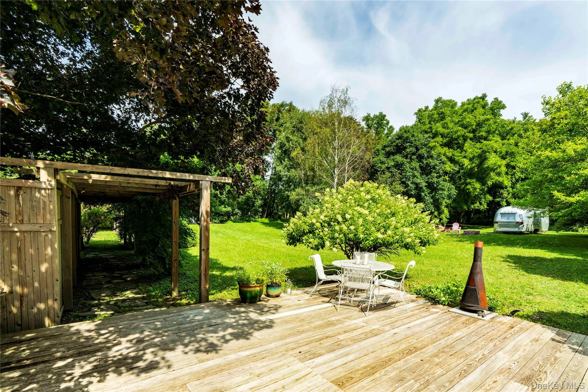 Large Back Deck Overlooks Property Large Back Deck Overlooks Property