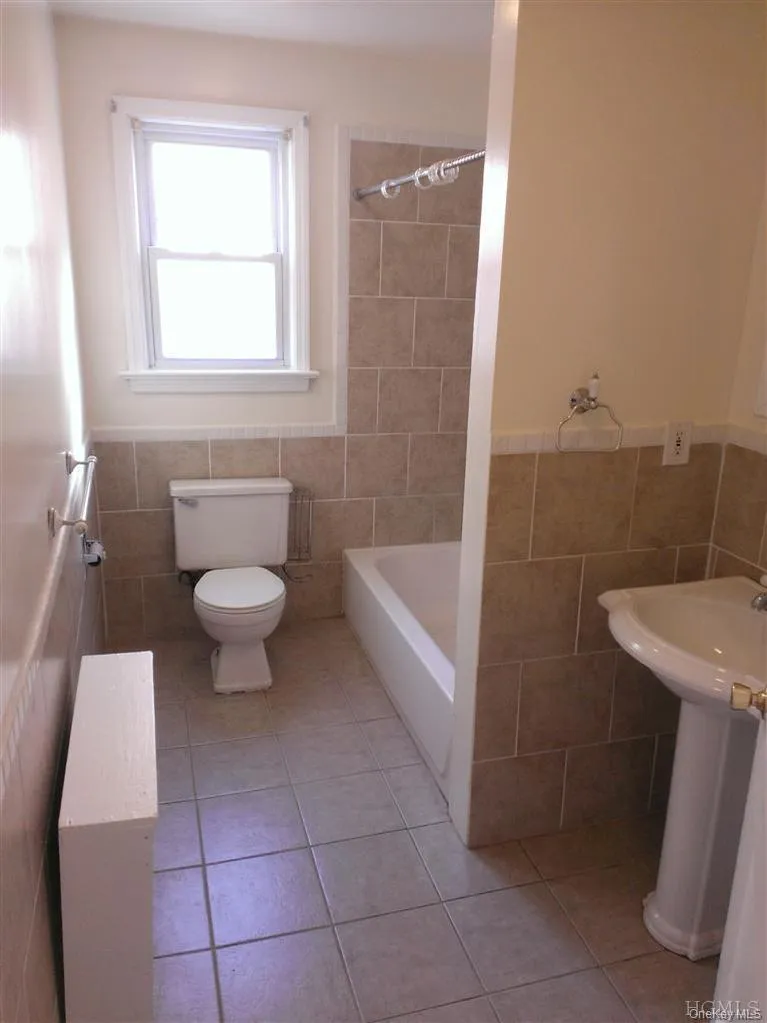 Fully-renovated full bathroom with bathtub on main floor Fully-renovated full bathroom with bathtub on main floor