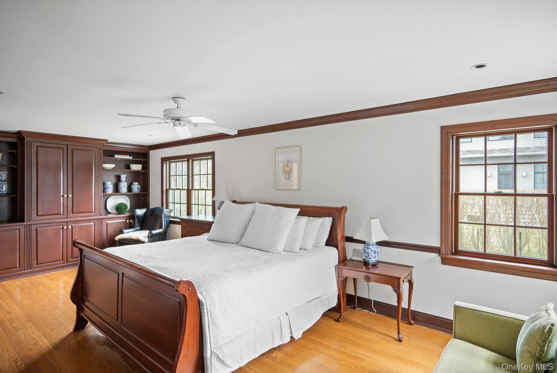 Primary en suite bedroom with built-in cabinetry Primary en suite bedroom with built-in cabinetry