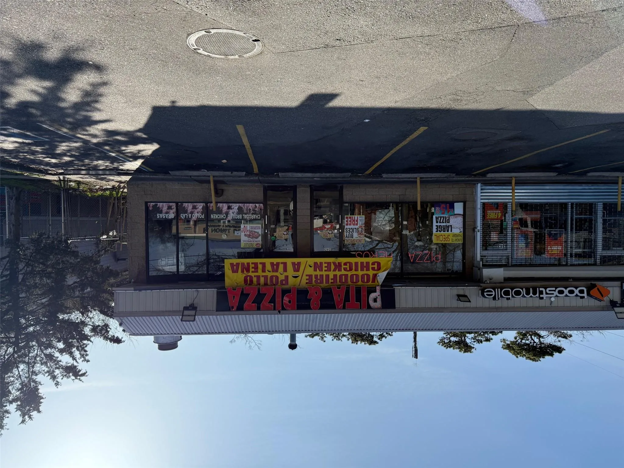 View of property featuring uncovered parking View of property featuring uncovered parking