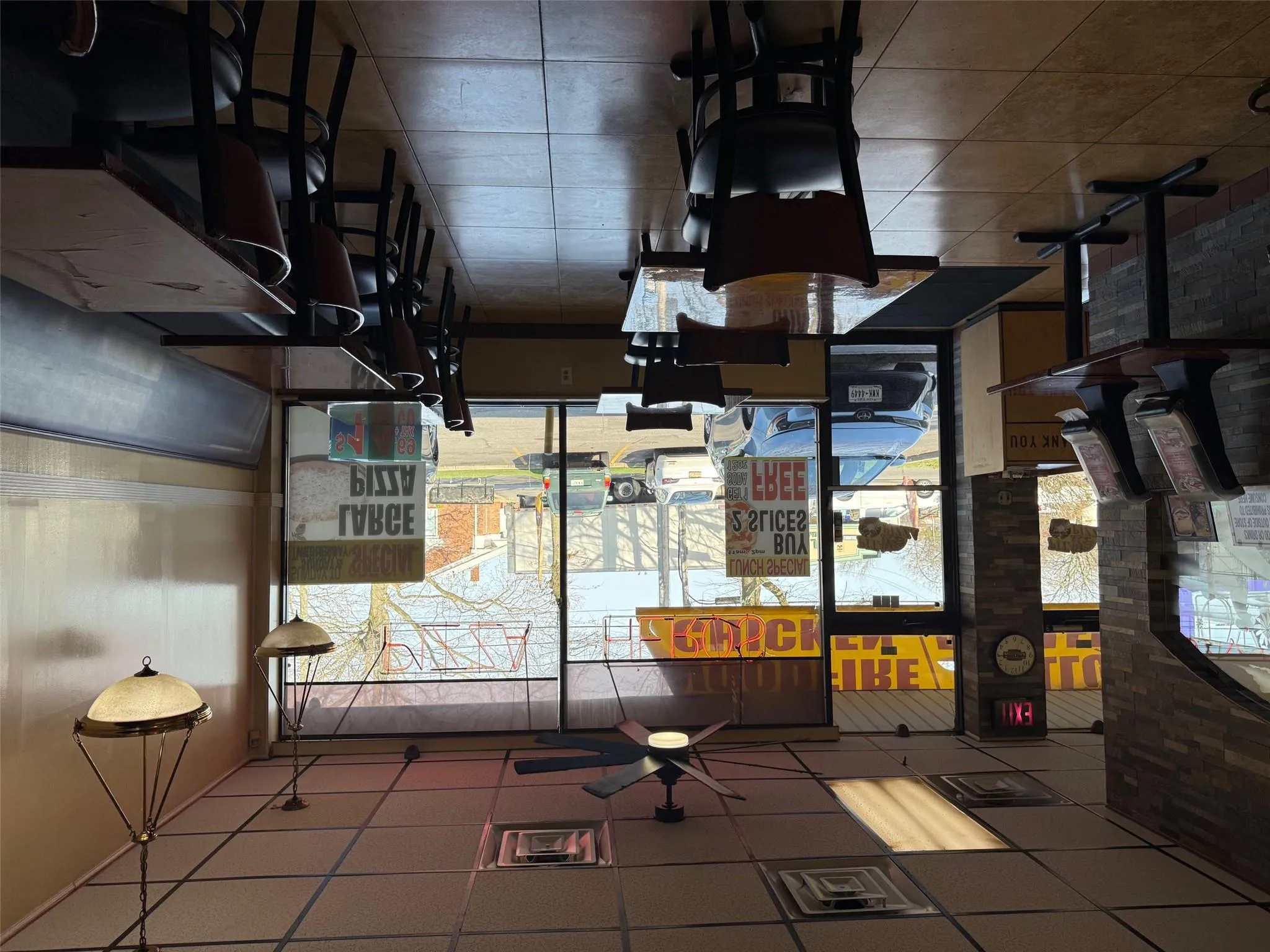 Dining room with visible vents, a paneled ceiling, and a ceiling fan Dining room with visible vents, a paneled ceiling, and a ceiling fan