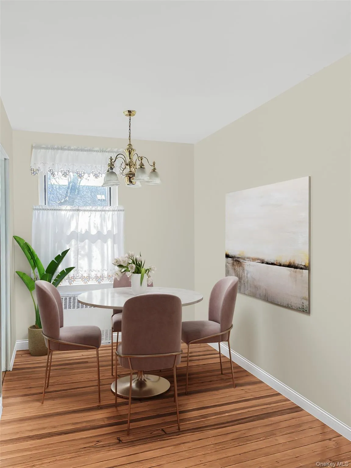 STAGED: Dining space featuring a chandelier and light wood-style floors STAGED: Dining space featuring a chandelier and light wood-style floors