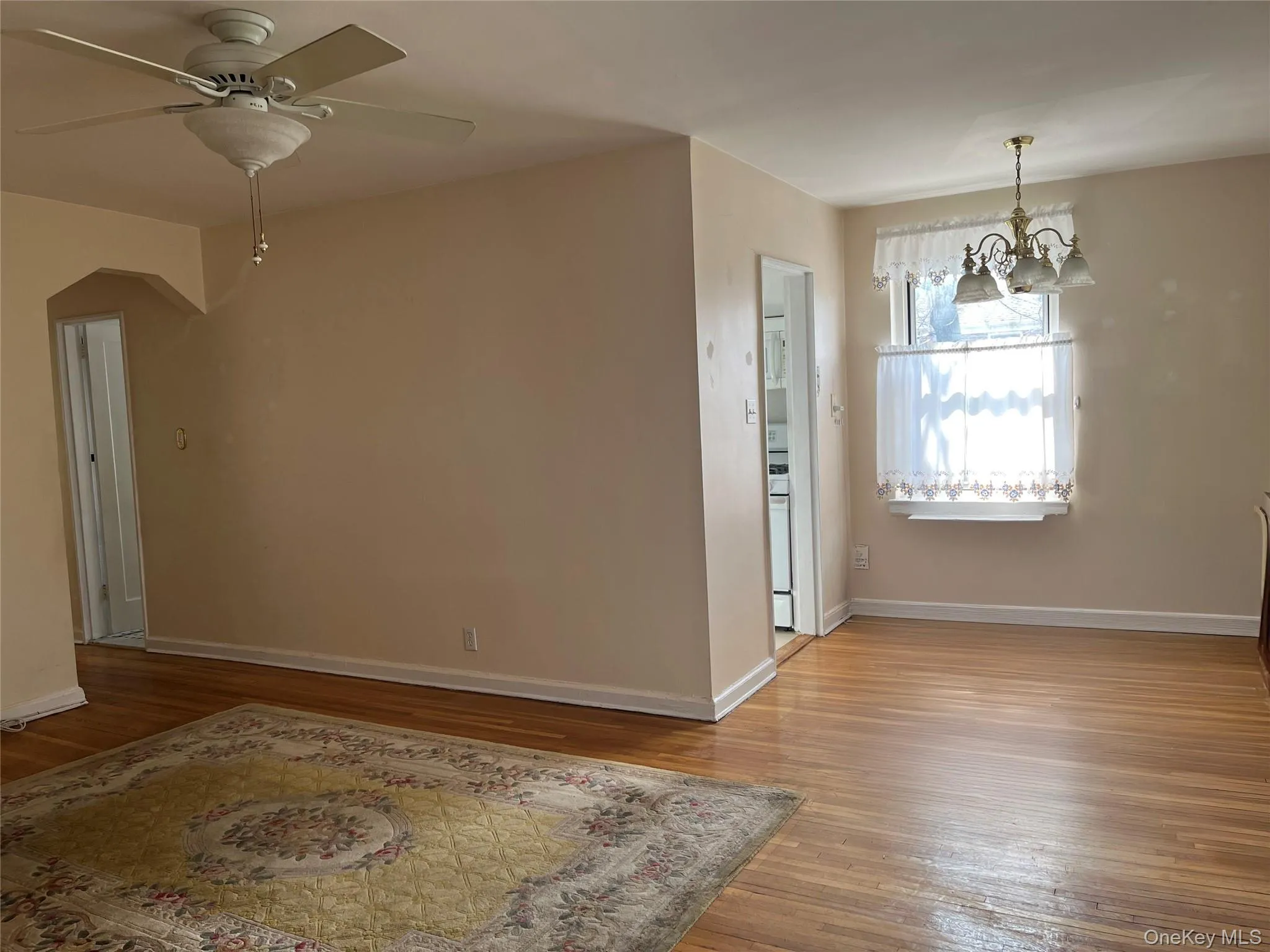 Living room/dining room area. Living room/dining room area.