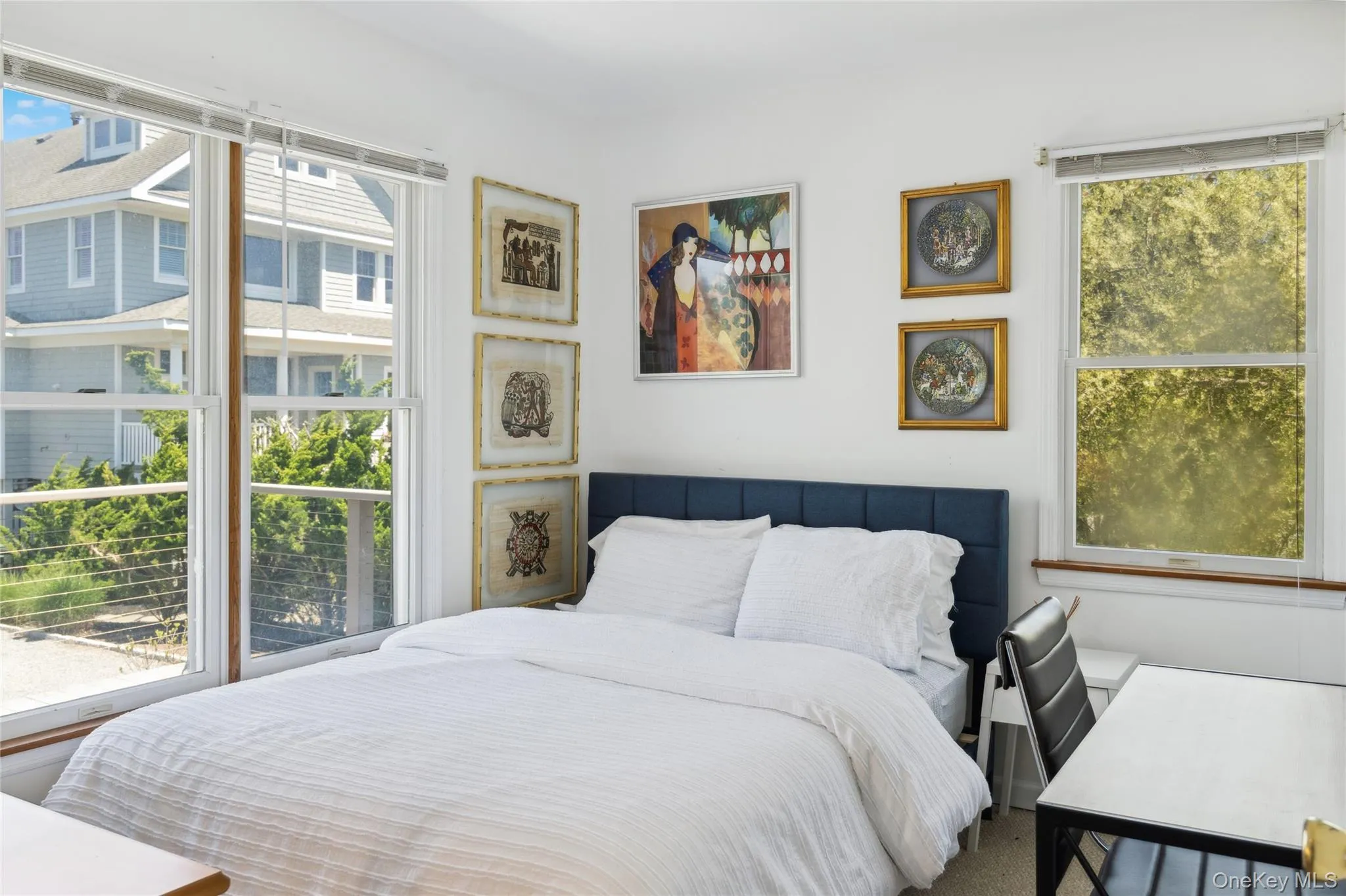 Bedroom featuring multiple windows Bedroom featuring multiple windows