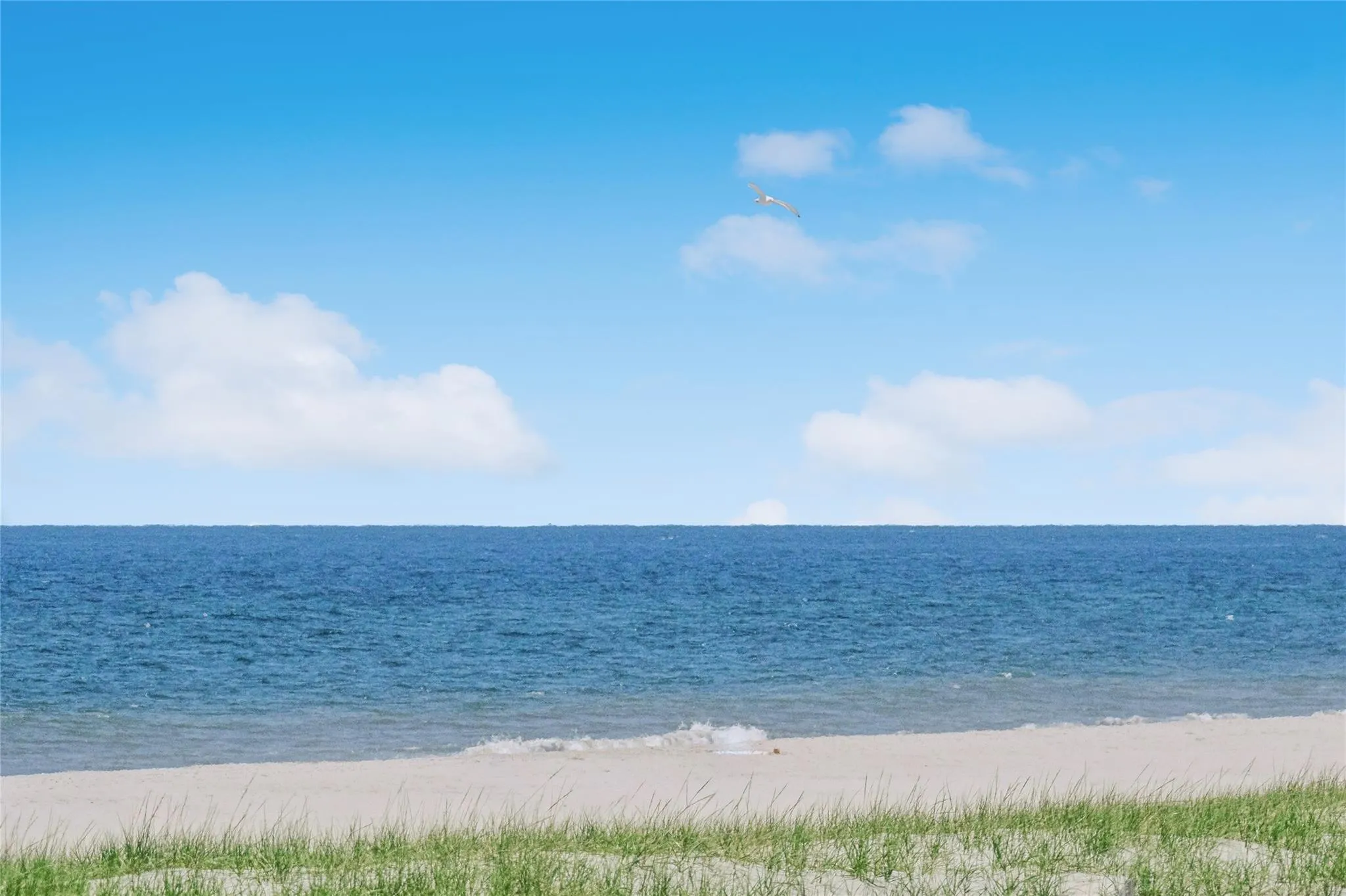 Property view of water with a view of the beach Property view of water with a view of the beach