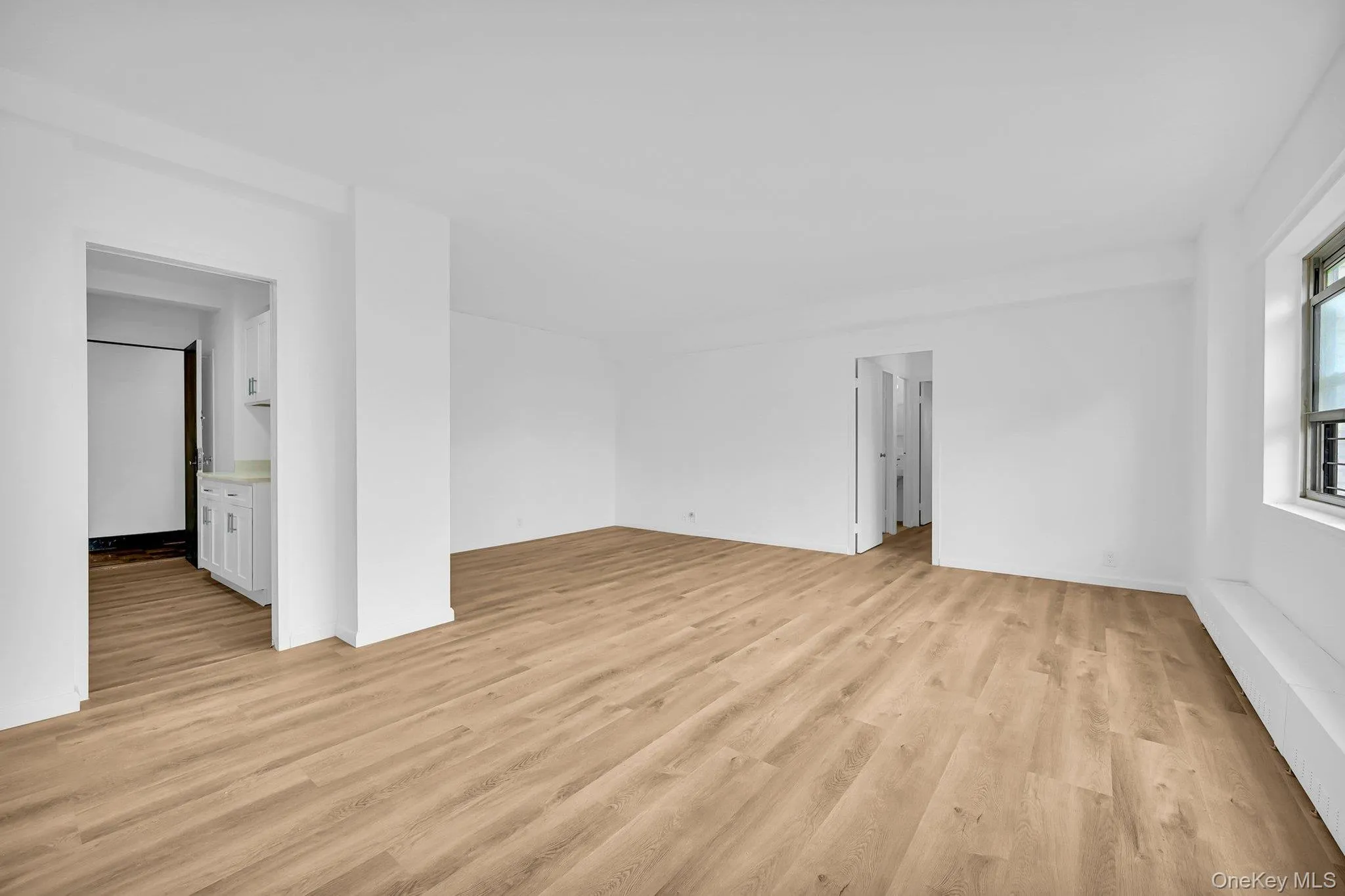 Empty room featuring light wood-type flooring Empty room featuring light wood-type flooring