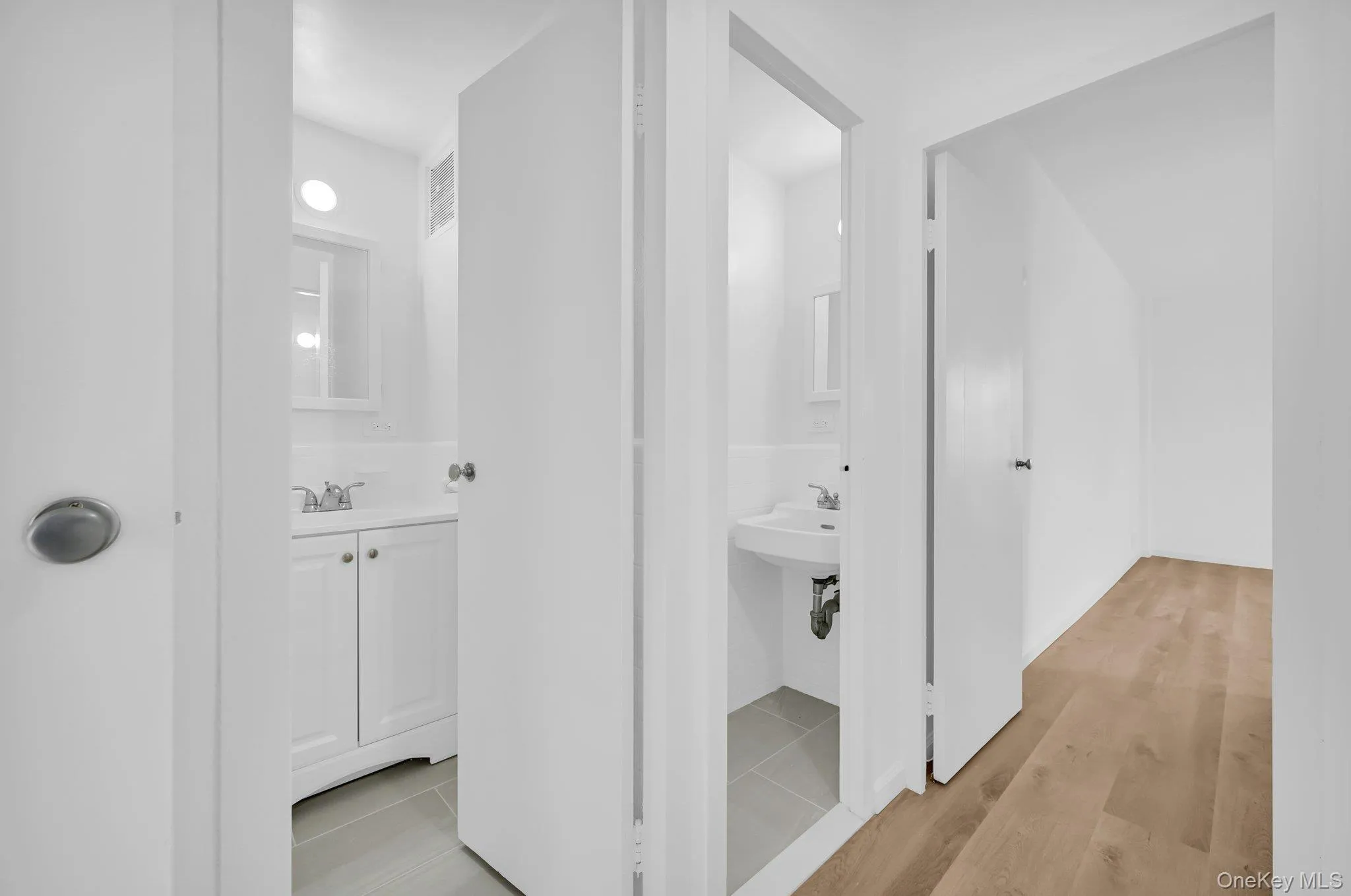 Bathroom with a sink, and ceramic finished floors Bathroom with a sink, and ceramic finished floors