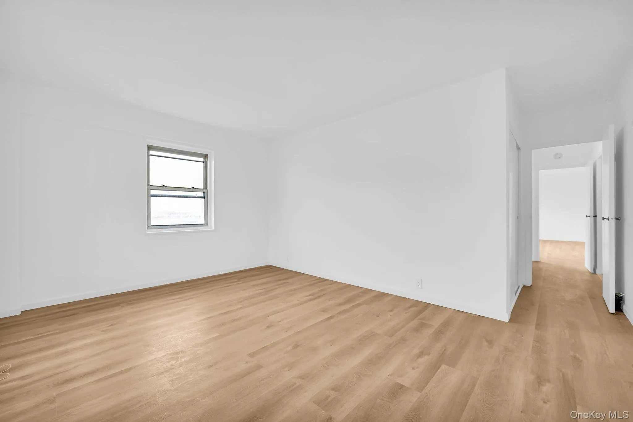 Master Bedroom featuring light wood finished floors Master Bedroom featuring light wood finished floors