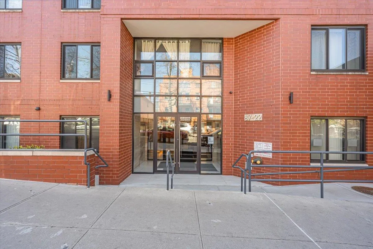 Property entrance with brick siding Property entrance with brick siding