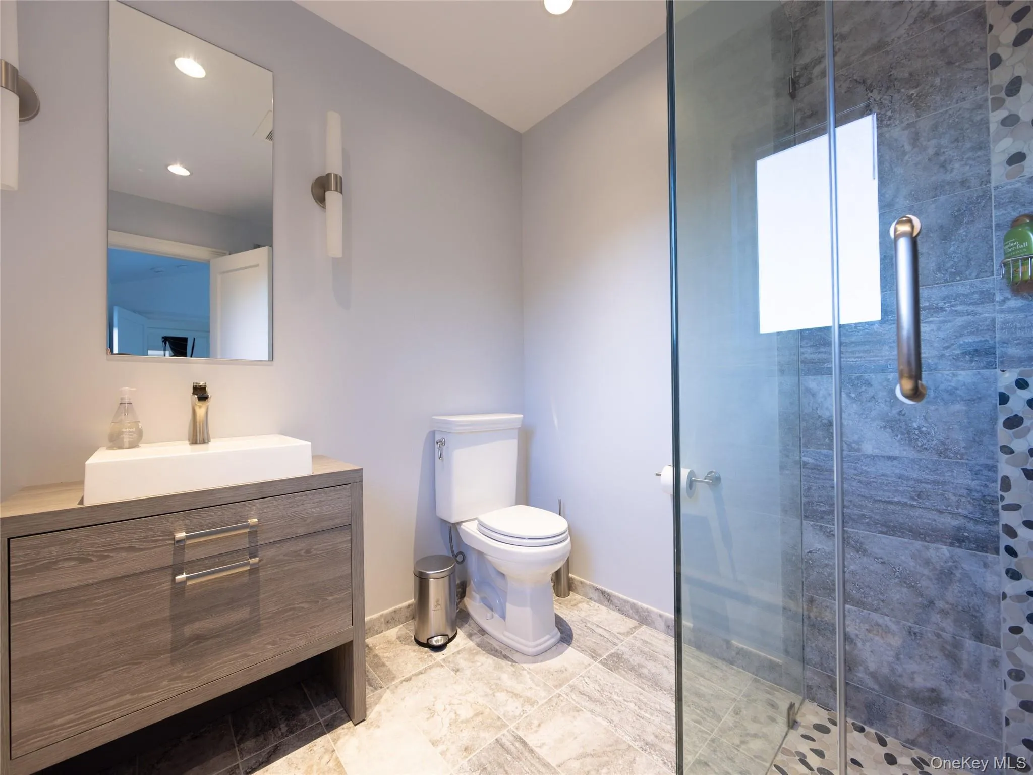 Full bathroom featuring vanity, baseboards, recessed lighting, toilet, and a shower stall Full bathroom featuring vanity, baseboards, recessed lighting, toilet, and a shower stall