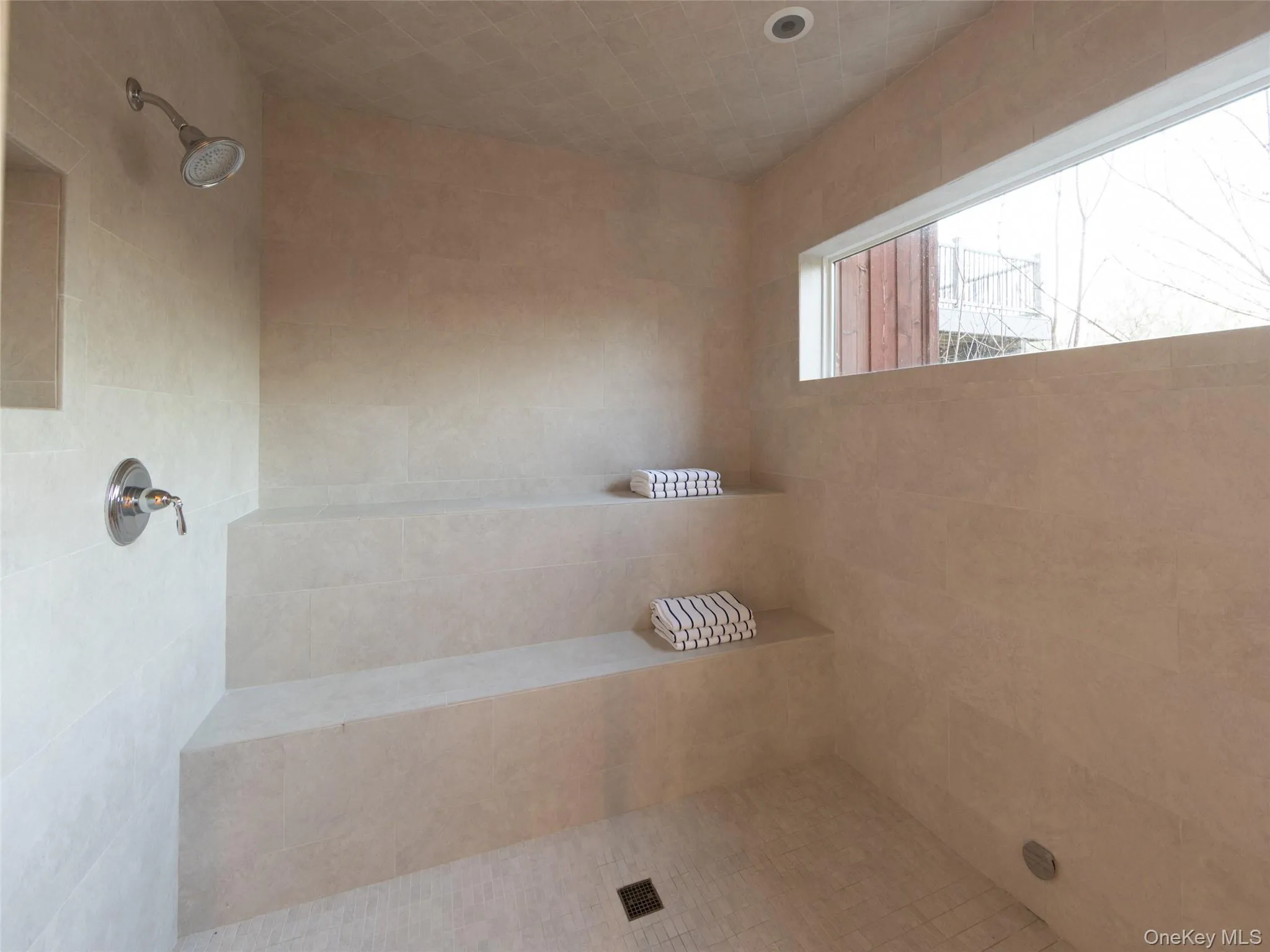 Bathroom with a tile shower Bathroom with a tile shower