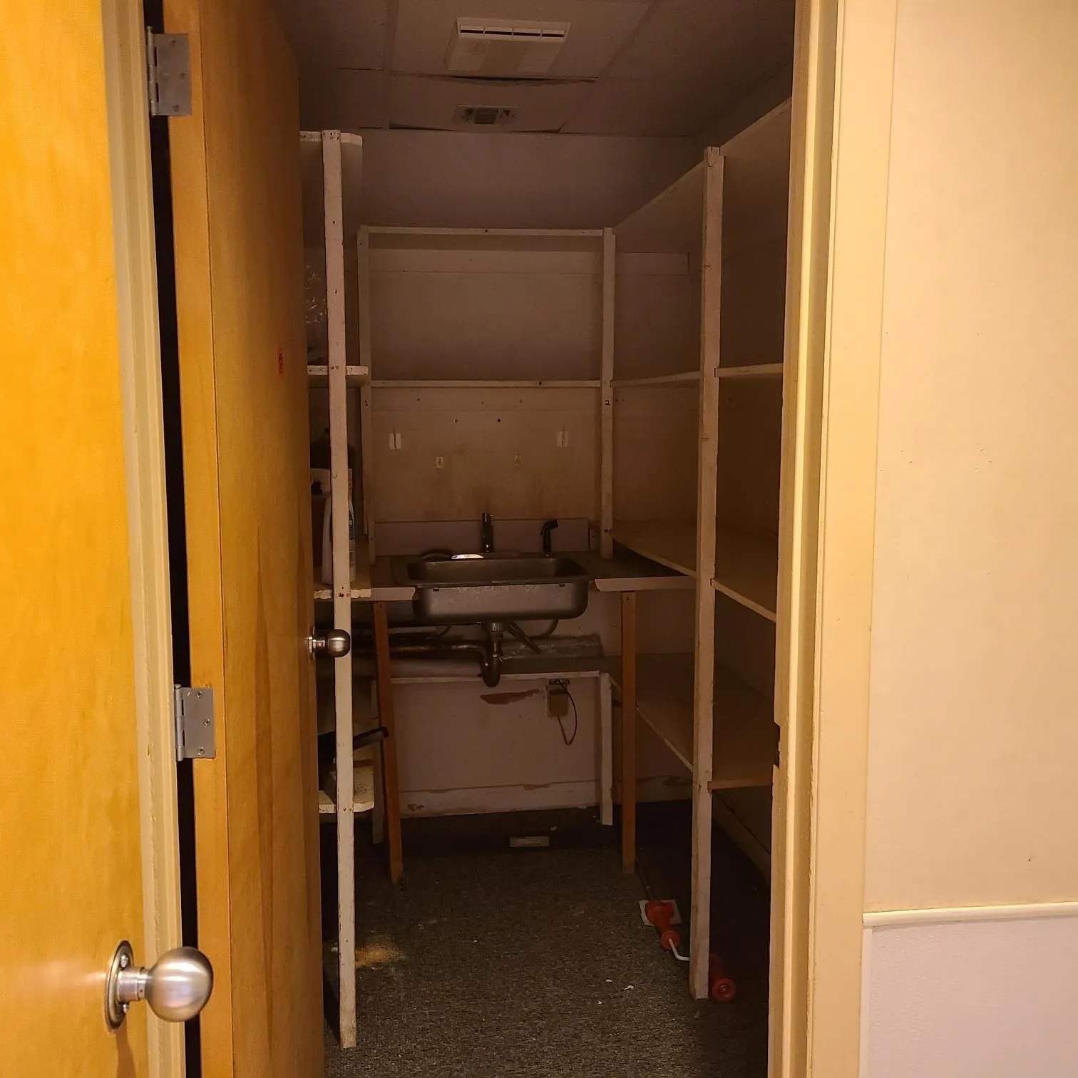 Storage room featuring a sink Storage room featuring a sink