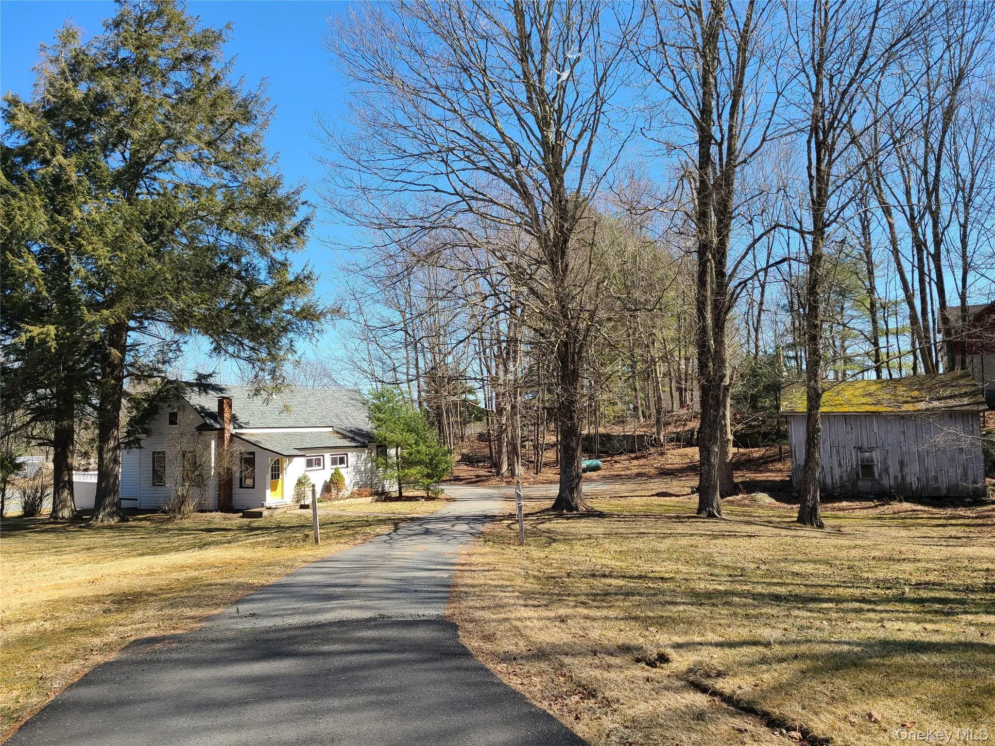 View of street featuring driveway View of street featuring driveway
