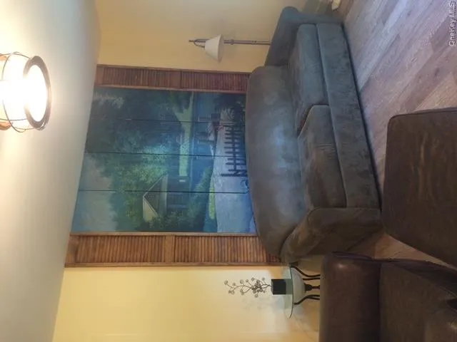 Living room with wood finished floors Living room with wood finished floors