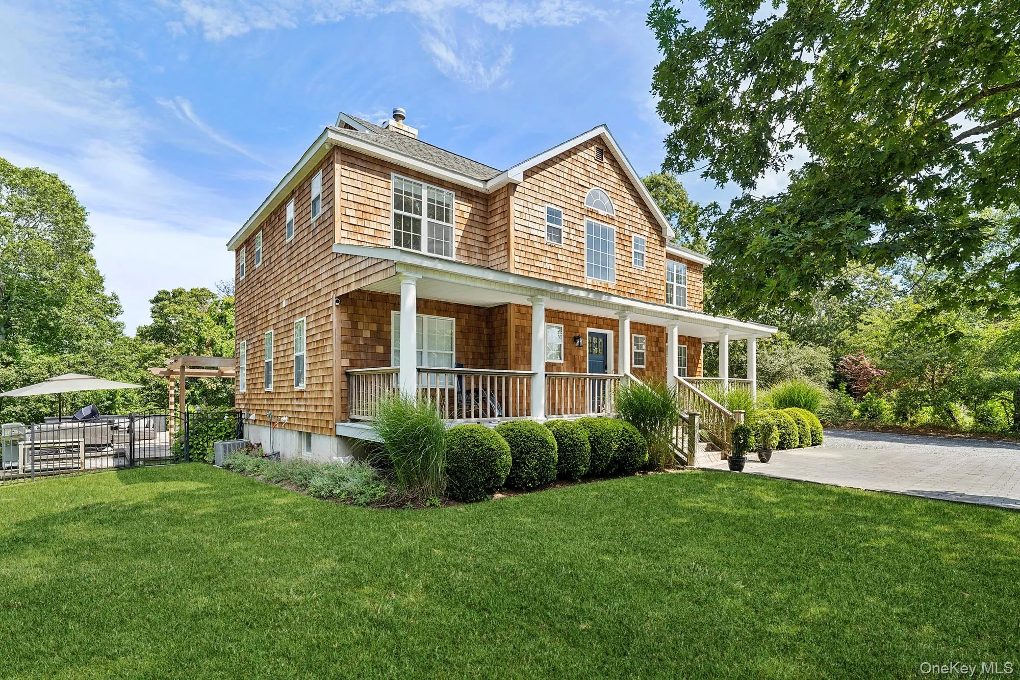 View of front of property with a porch and a chimney View of front of property with a porch and a chimney
