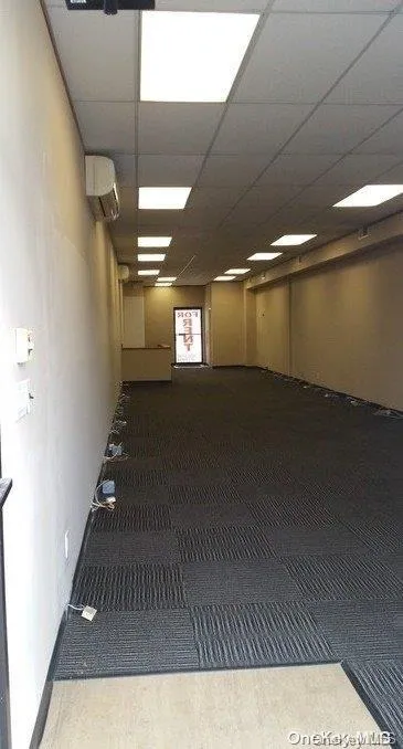 Unfurnished room featuring a paneled ceiling Unfurnished room featuring a paneled ceiling